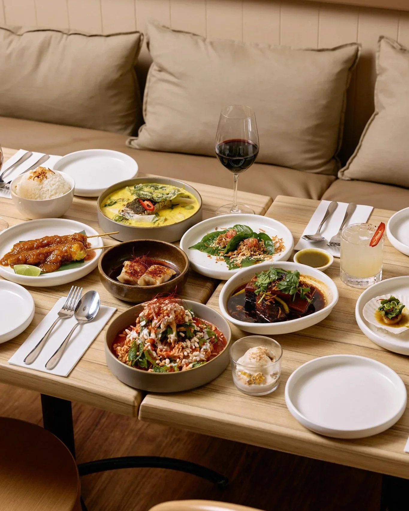 photo of a table with a lot of thai dishes on it at Chalong Restaurant
