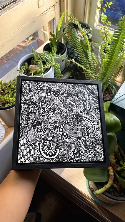 Daydreams in Black Plants Hand.jpg