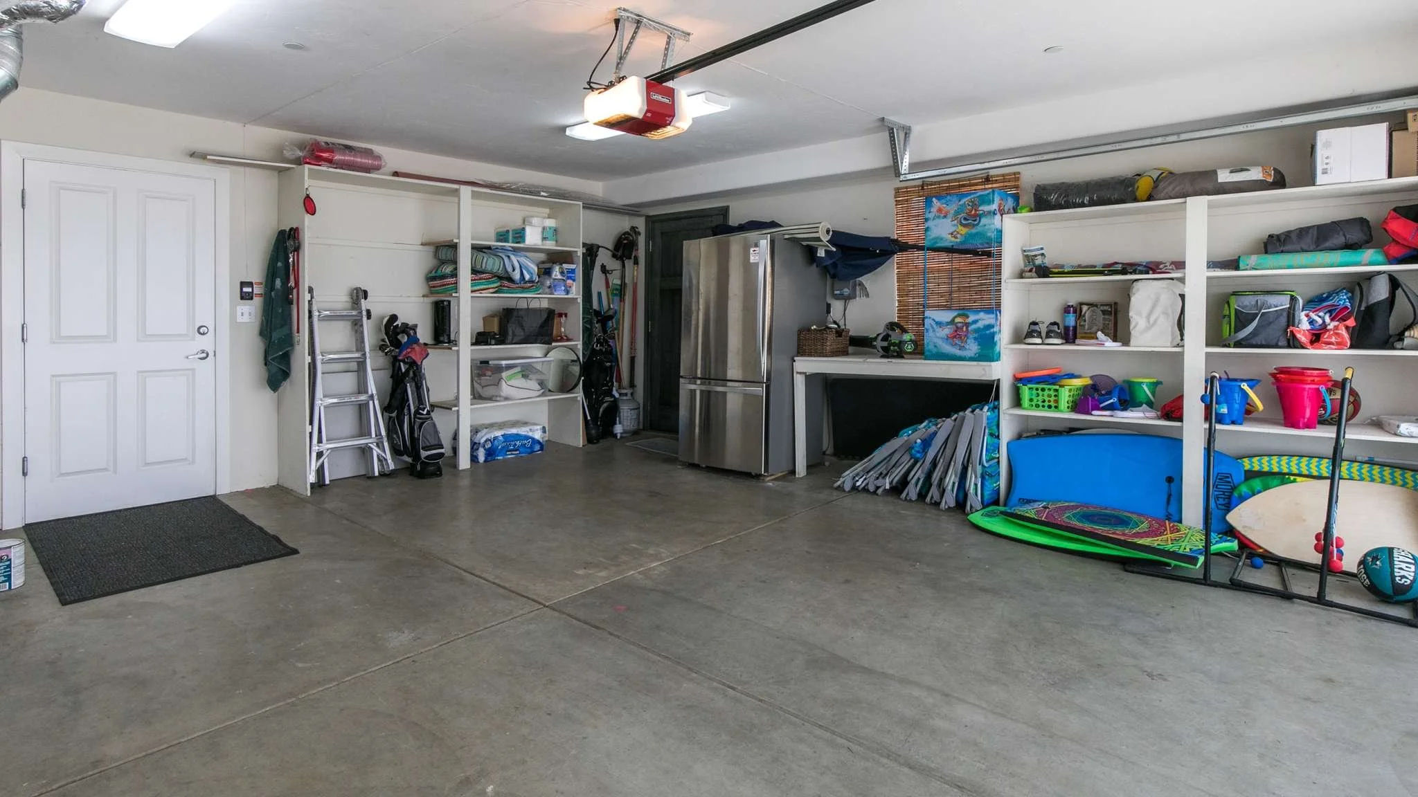 Garage storage with beach equipment and more. 
