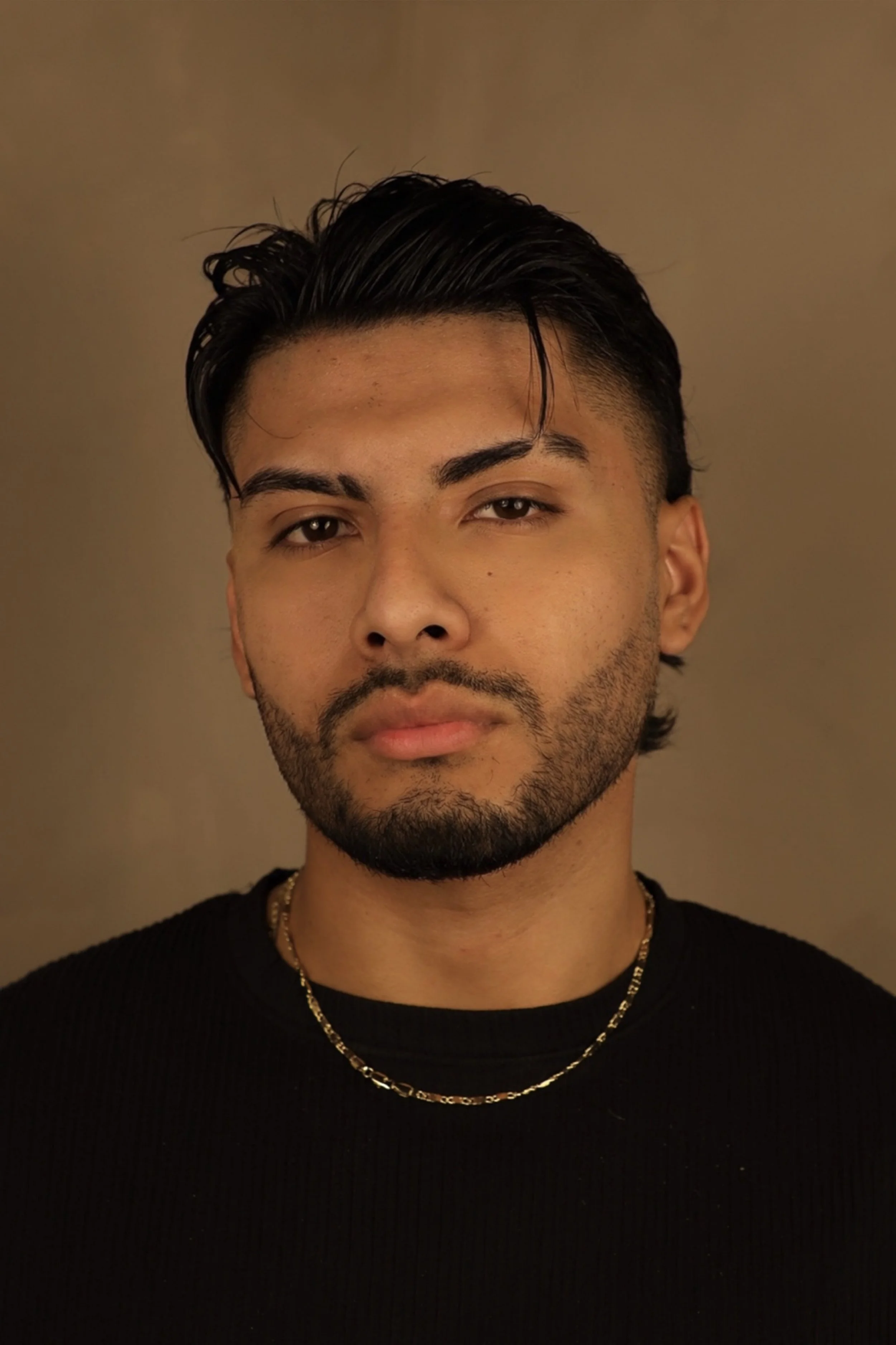 Professional headshot of barber at Ben’s Luxe Barber, luxury men’s barbershop in Dallas, Texas
