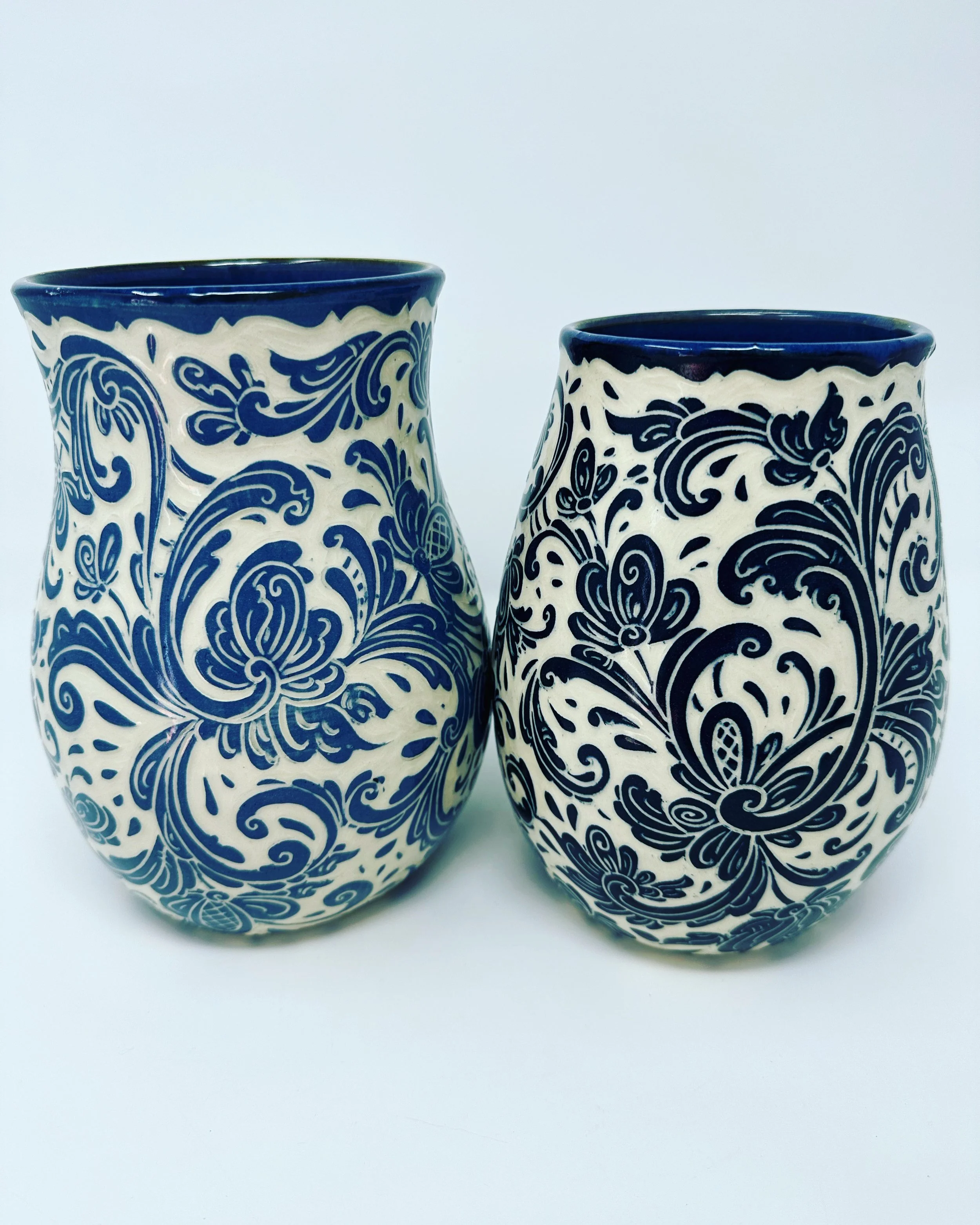 carved rosemaling vases
