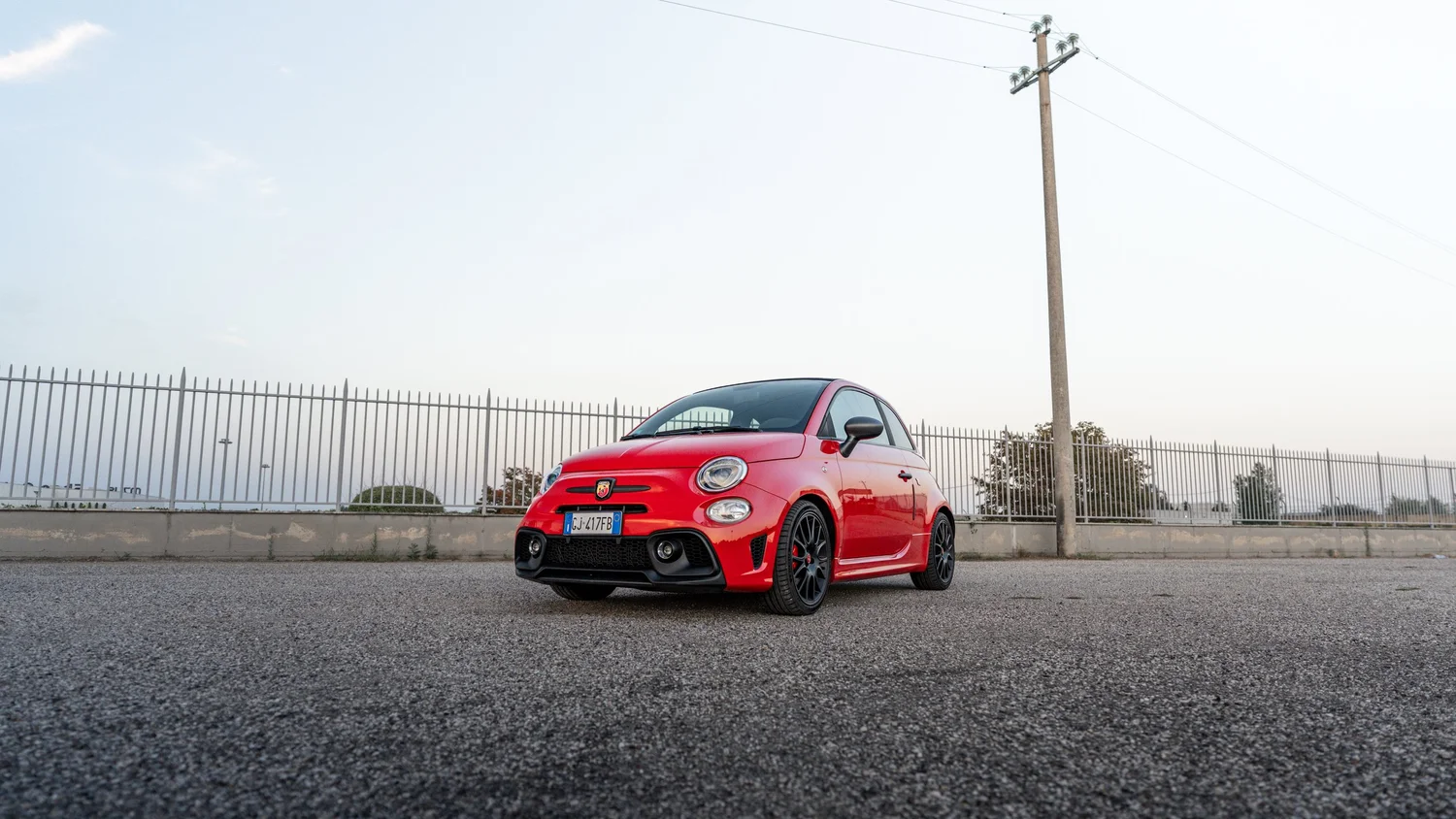 Red Abarth 595 Competizione photographed at Lake Garda