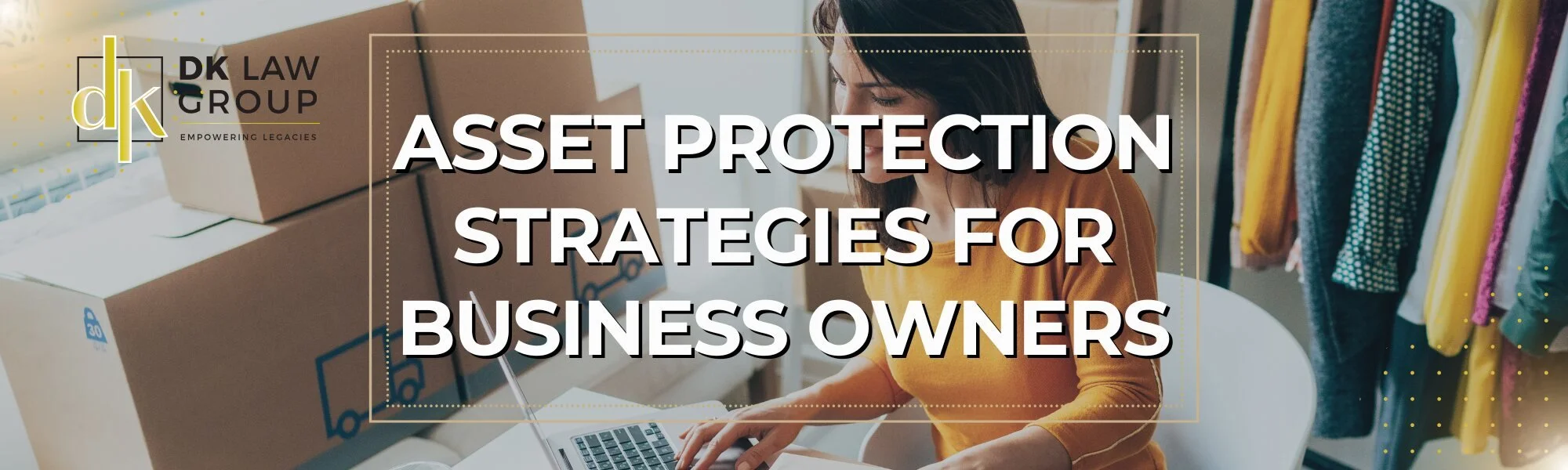 Business owner working on a laptop, illustrating asset protection strategies.