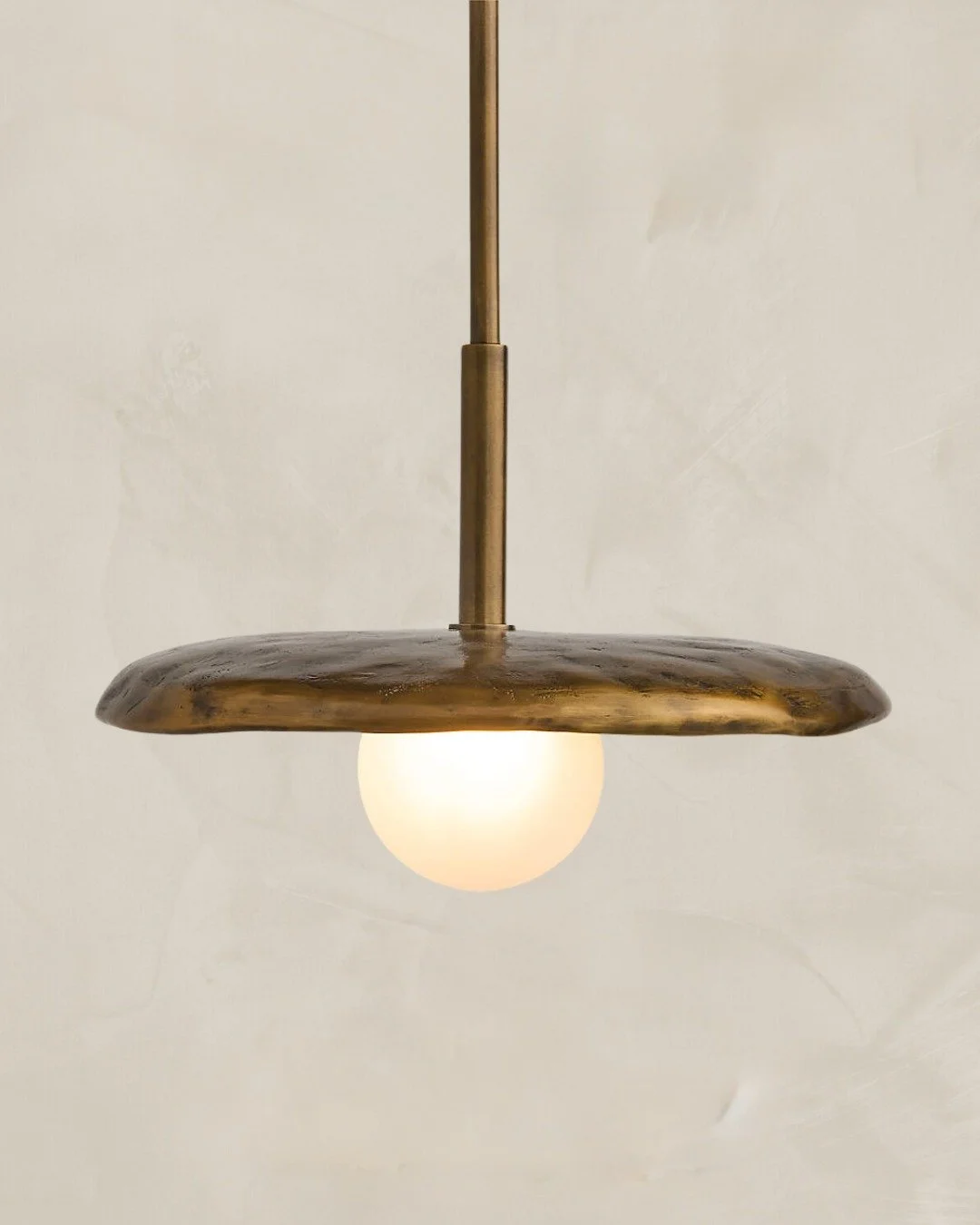 I&rsquo;m in love with this pendant that feels like a sculpture: the Lilypad by designer Brigette Romanek.
What drew me in? The fluidity. The movement. The delicate organic shapes that seem to float, as if dancing in the air.

It&rsquo;s not just a s