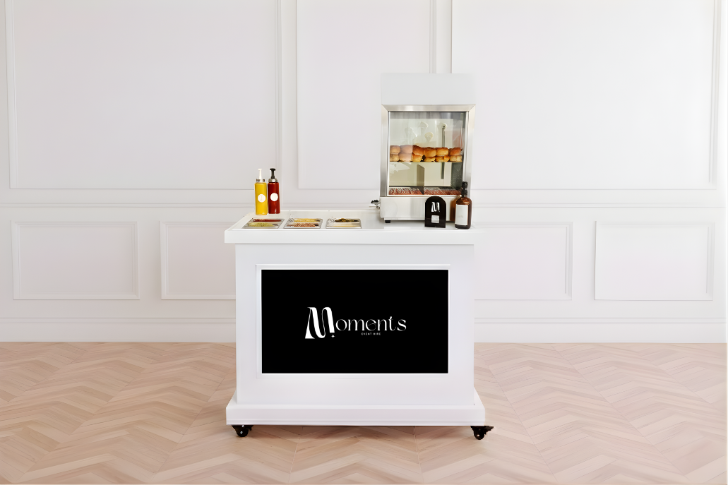 Hot dog machine on white cart with digital screen