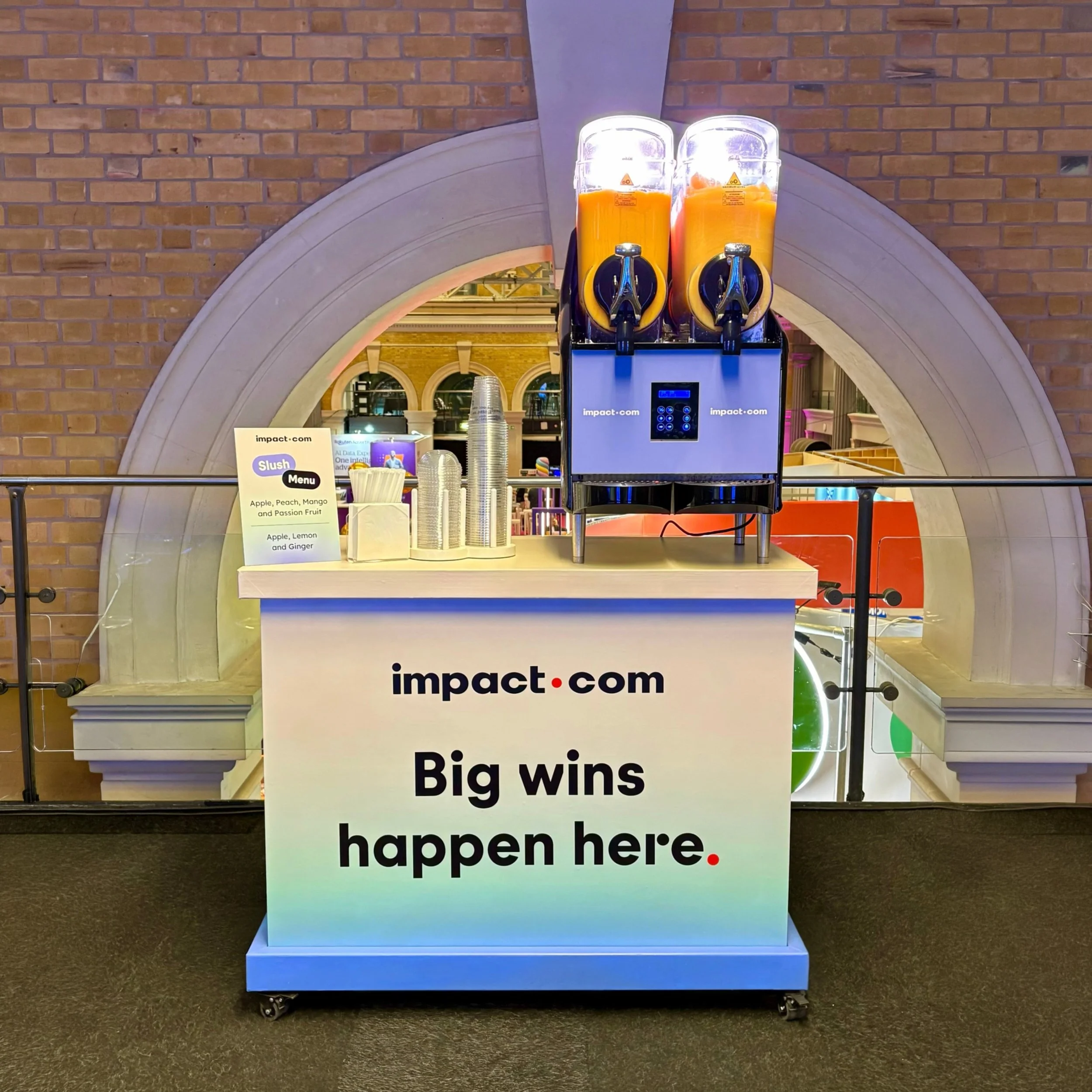 Fully wrapped branded slush cart for impact.com with a custom slush panel at Old Billingsgate, London
