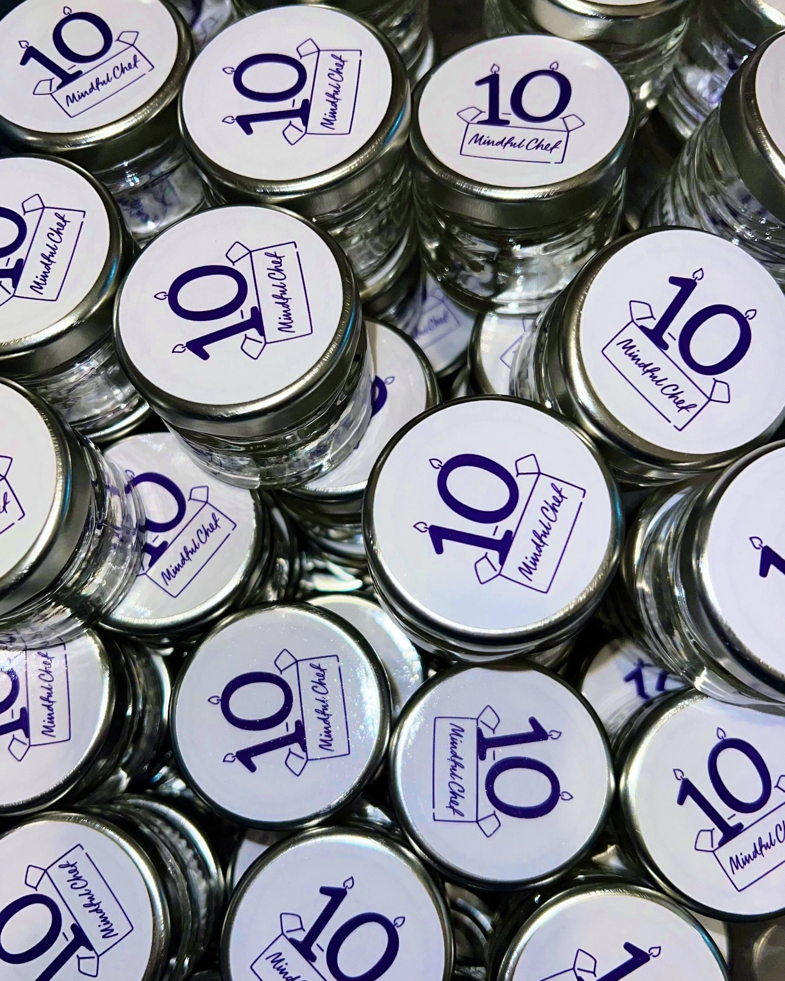 Custom honey jars on charcuterie cart at the Mindful Chef anniversary event