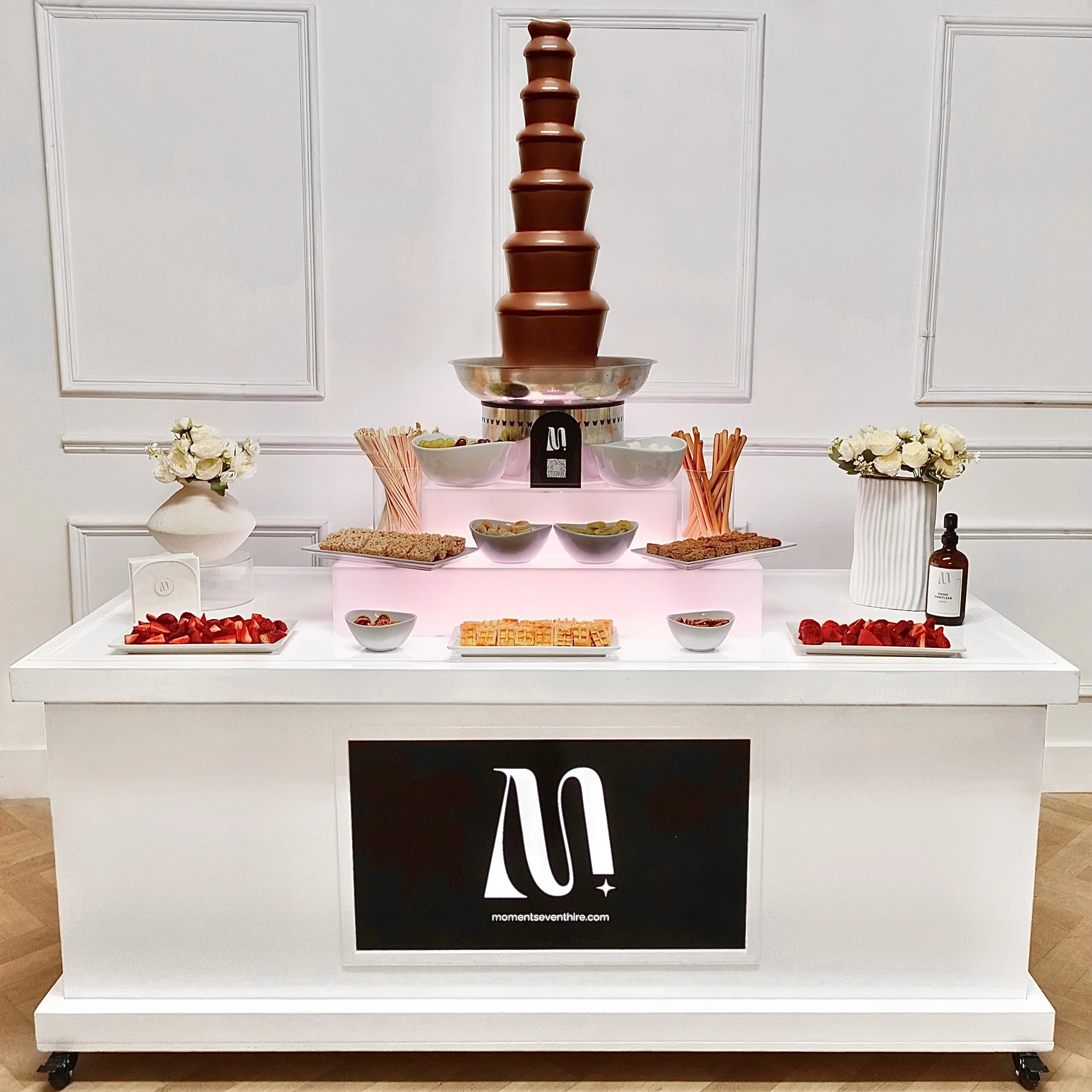 Chocolate Fountain Machine on white cart with digital screen