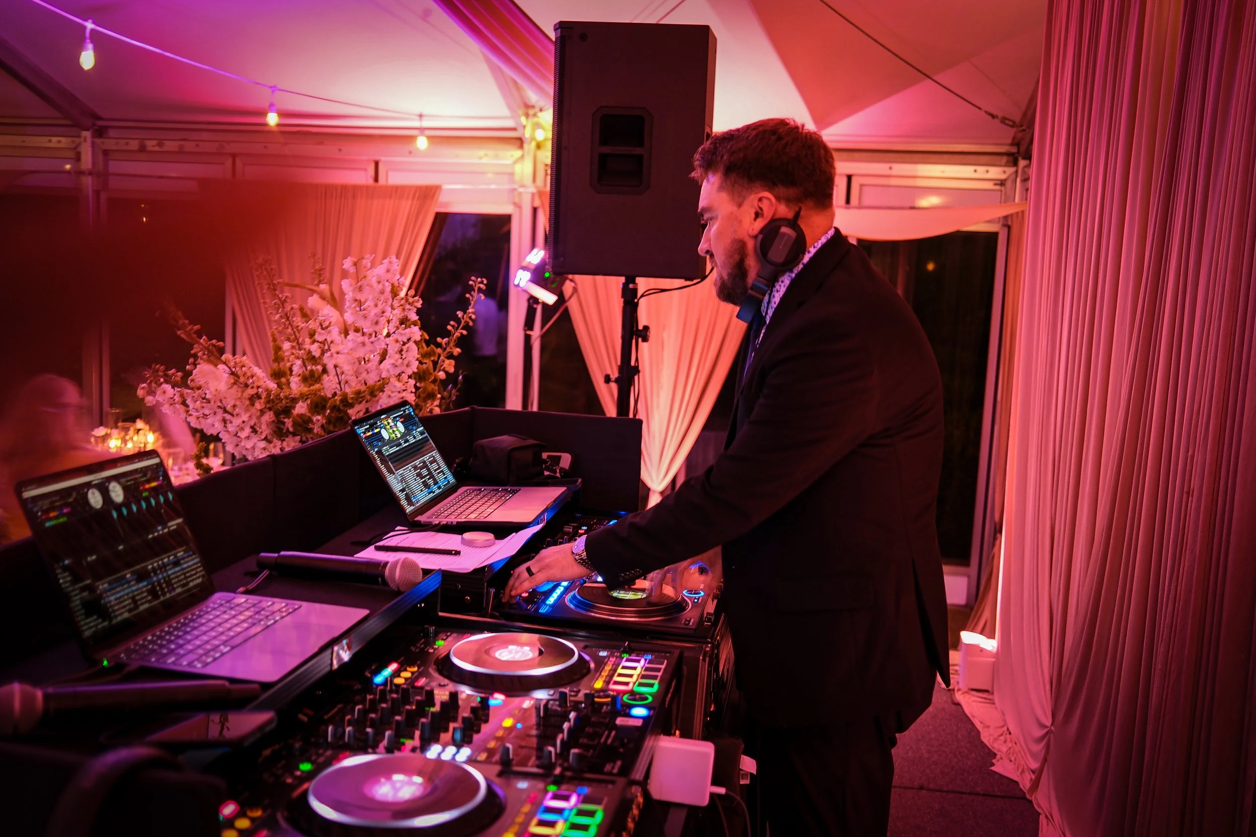 Fuse DJing A Large Luxury wedding on a Stage.