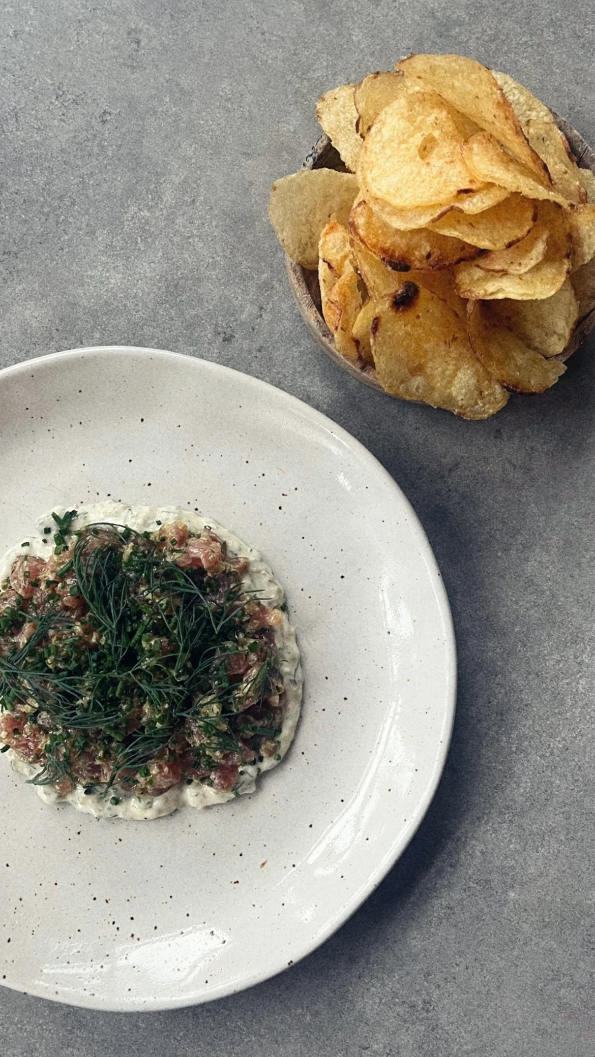 Tuna, Remoulade, Soft Herbs, Crisps.
