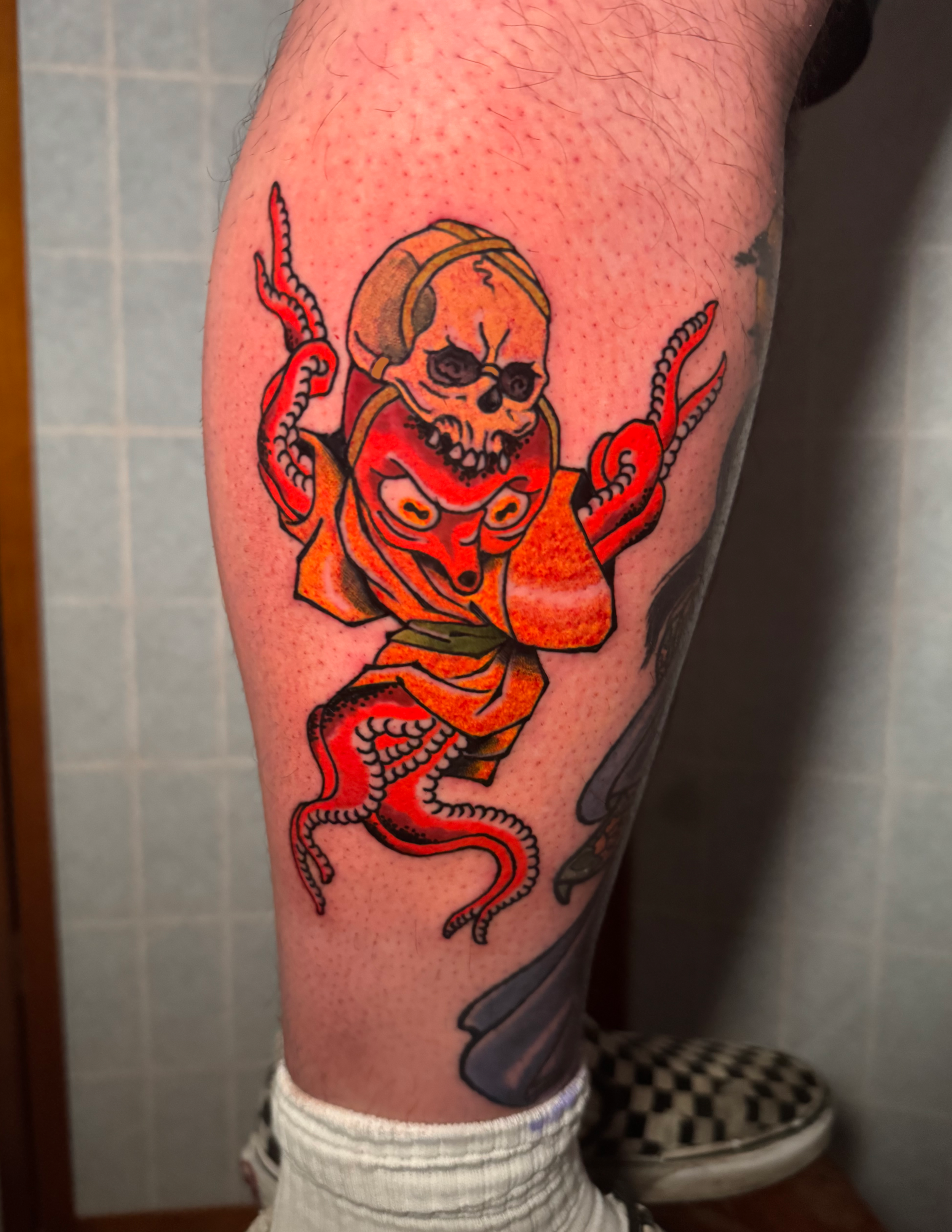 Japanese style octopus tattoo with human skull cap irezumi ukiyoe yokai