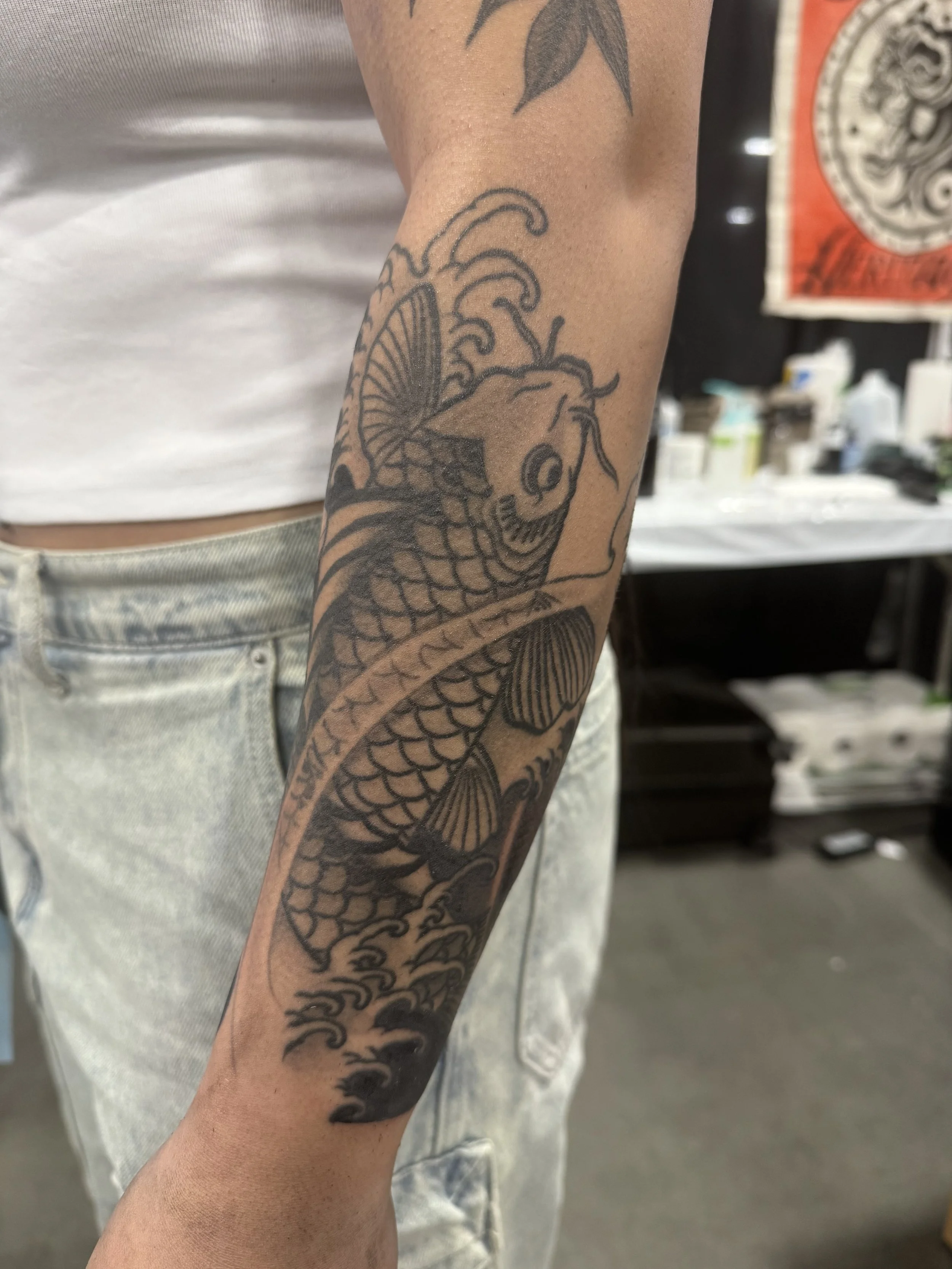 Las Vegas Japanese style Tattoo Koi fish with Japanese style finger waves irezumi Tattoo