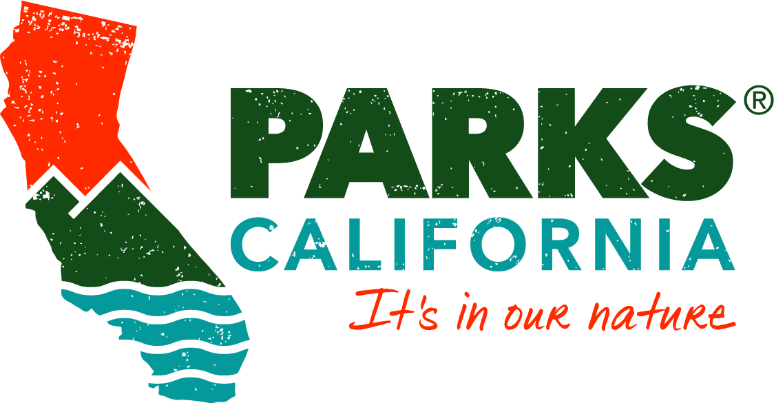 Logo of Parks California featuring a stylized map of California divided into red, green, and blue sections, with the text "Parks California" and the tagline "It's in our nature" in red.