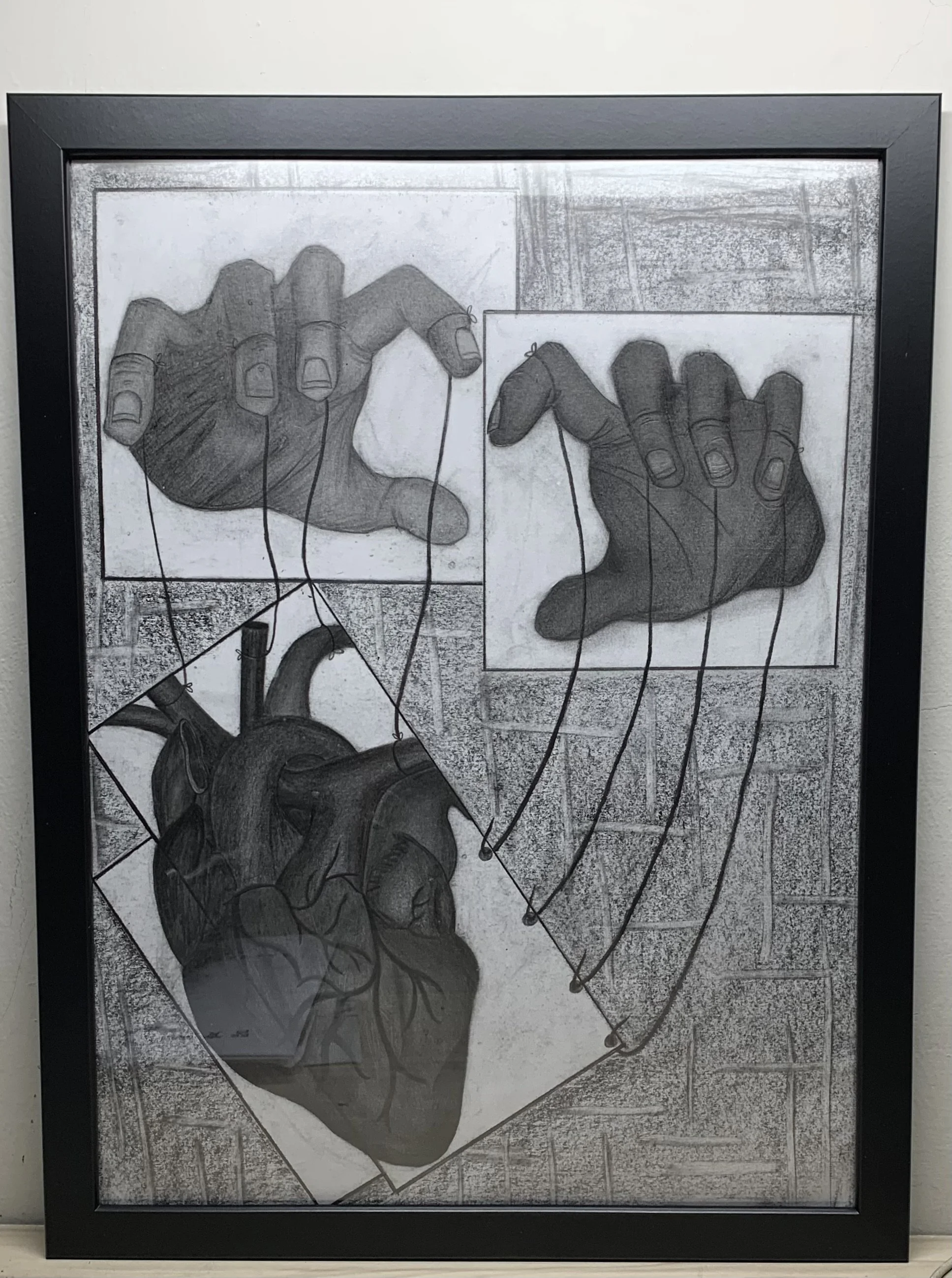 Black and white drawing of human hands with connecting strings, a human heart, and a photograph of a human heart, arranged in geometric sections.
