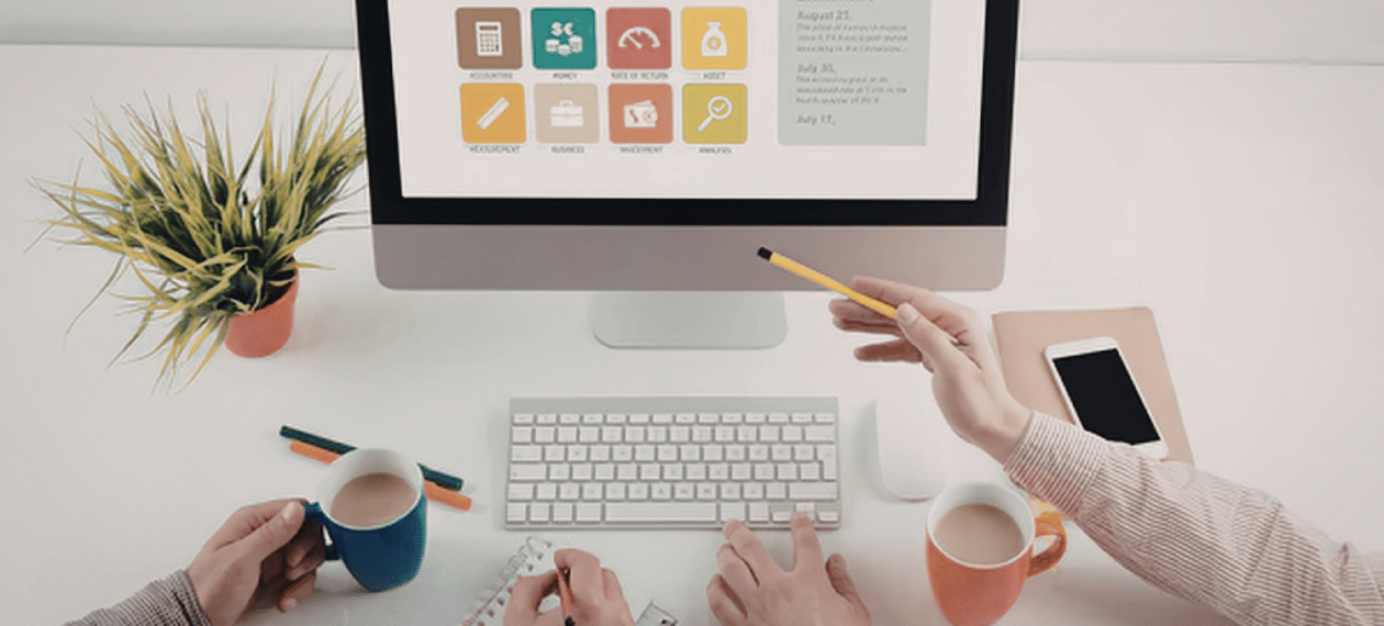 Desktop workspace with digital tools for managing an online business