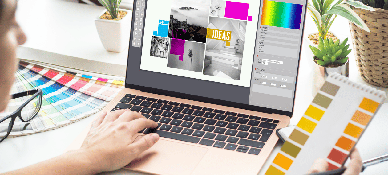 Person creating digital content and online course materials on a laptop