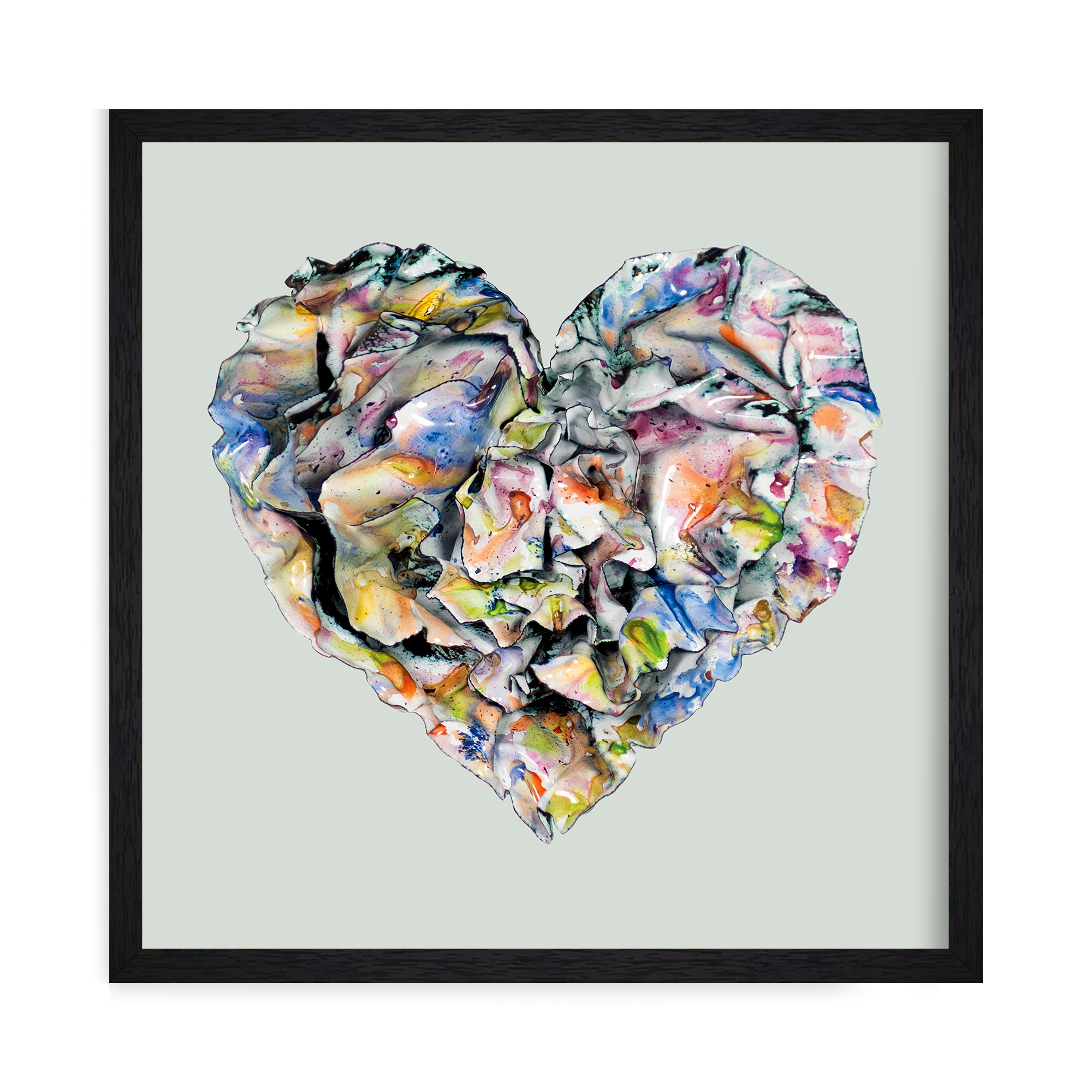 Framed Watercolor enamel heart print titled “Held Lightly” with soft multicolored folds and pastel floral tones