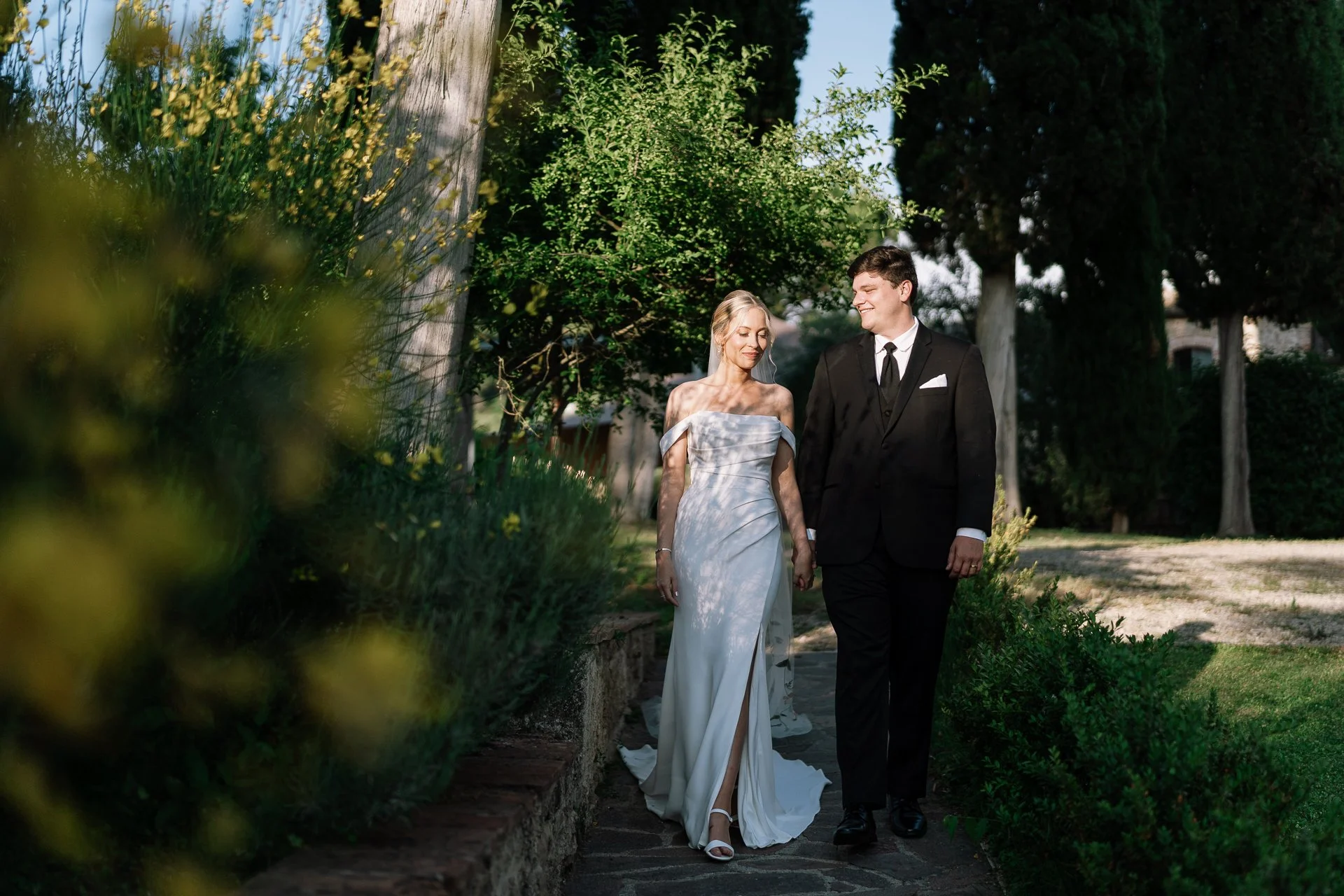 Authentic destination wedding couple shoot with panoramic countryside views at Antico Borgo San Lorenzo.