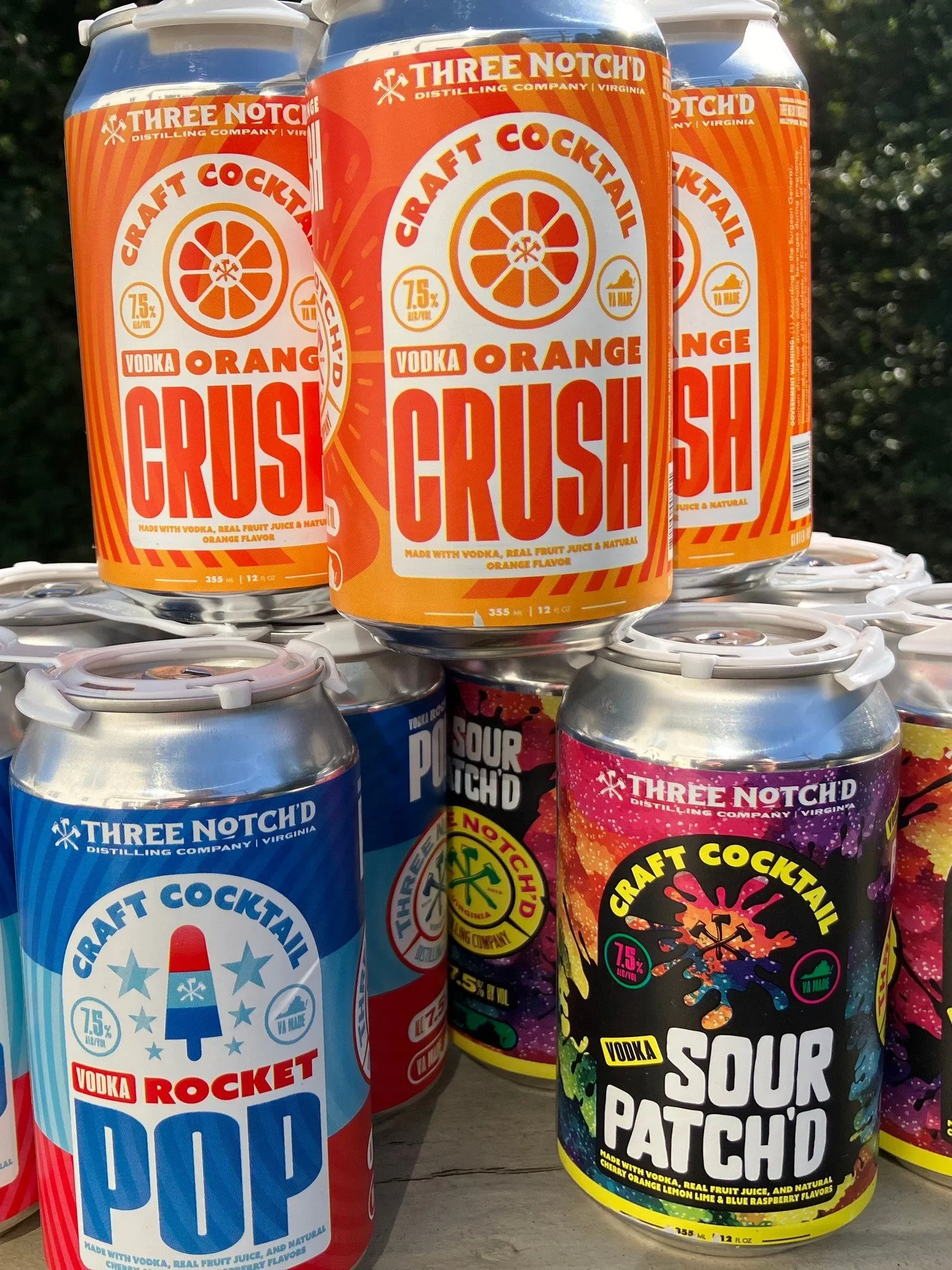 🍹 Cheers to flavor-packed adventures! Stack up the fun with our @threenotchd Craft Cocktail 4-packs&mdash;Orange Crush for that zesty punch, Rocket Pop for patriotic pops of flavor, and Sour Patch for a wild berry twist. Made with real vodka, real f