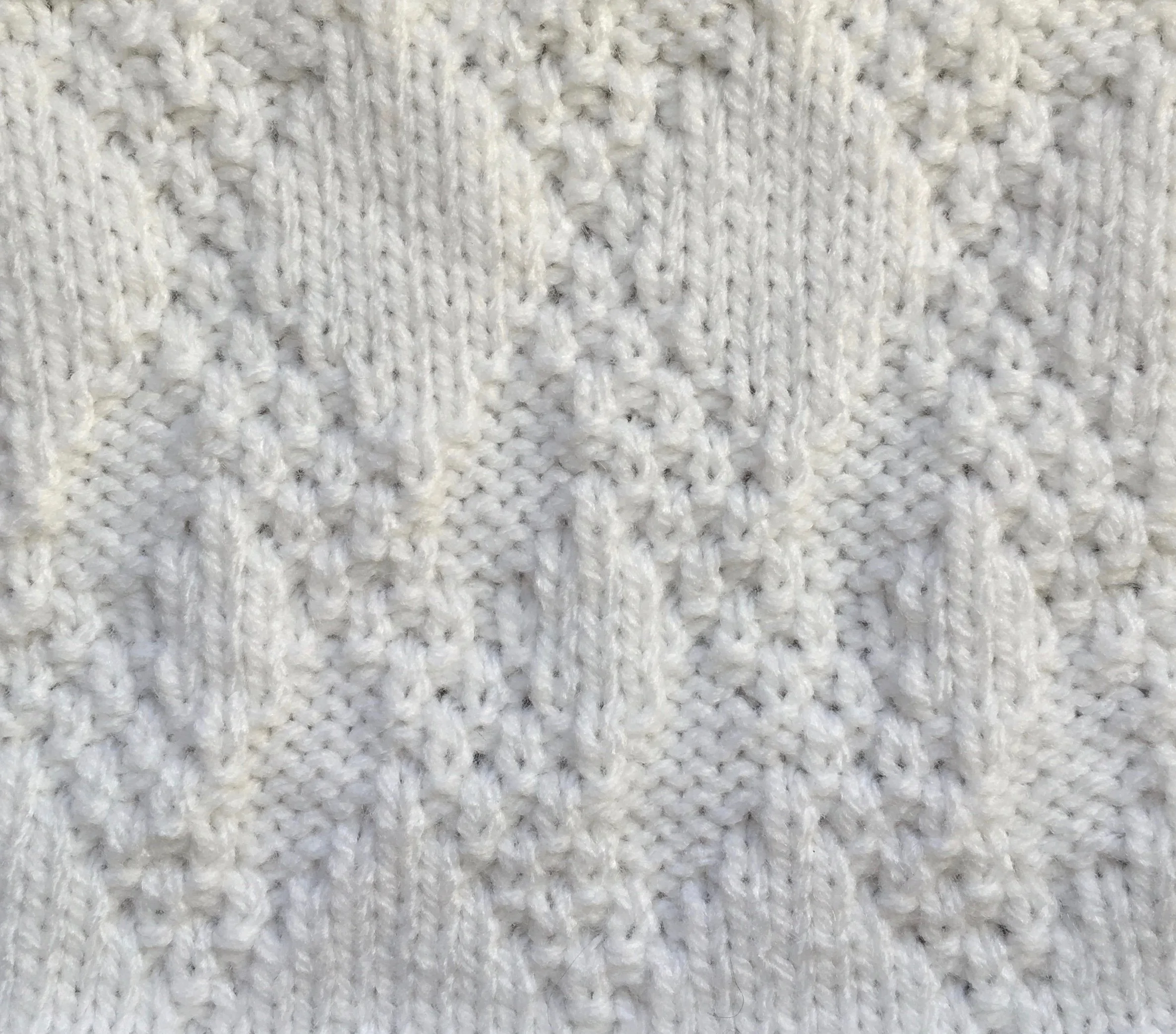 10 sts x 28 rows KPT Double Diamond Brocade (I-A-13-b-4-(9)) WS.jpg