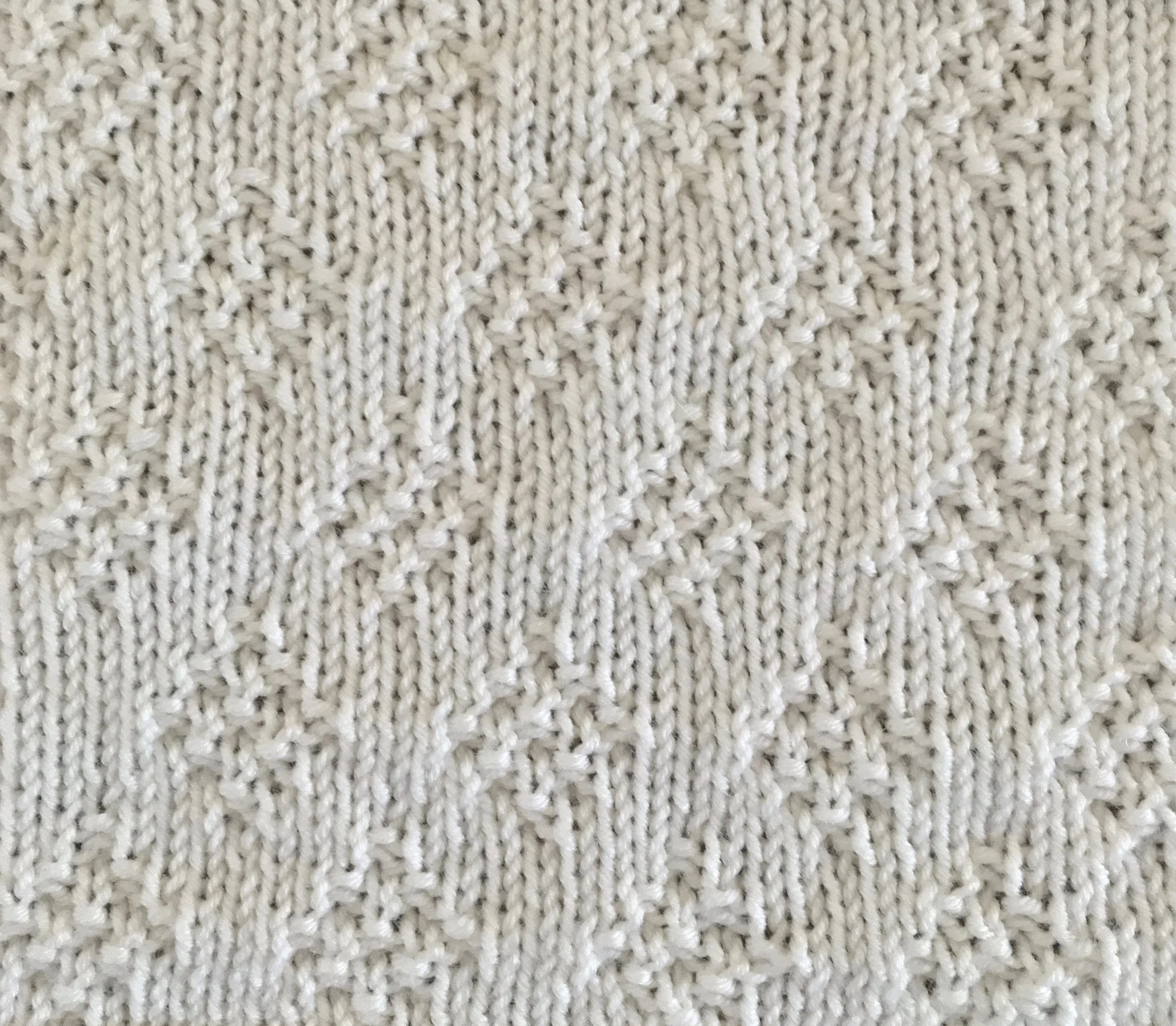 8 sts x 20 rows KPT Moss Stitch Diamonds (I-A-13-a-(22)) WS.jpg