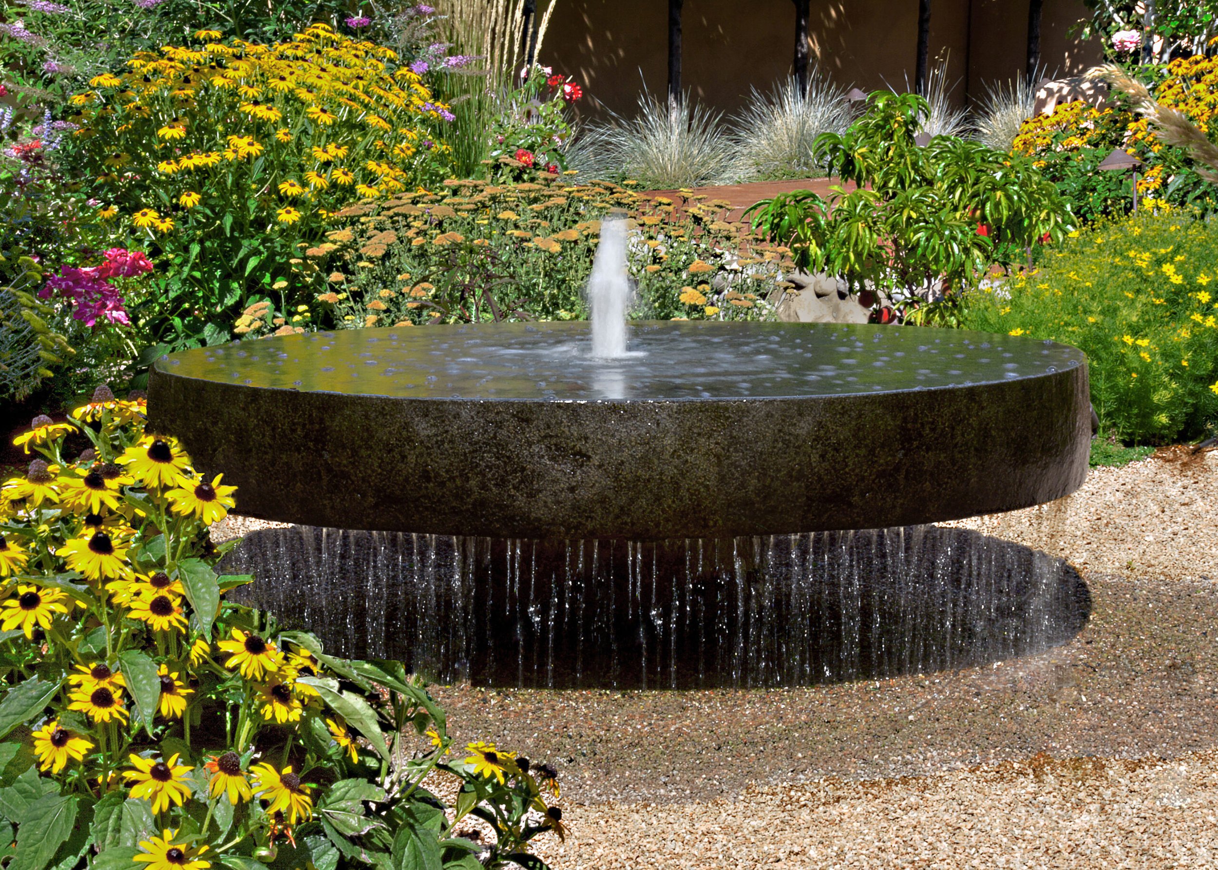 Custom-Natural-Millstone-granite-by-Stone-Forest.-Photo-by-Ali-Byrne.-scaled.jpg