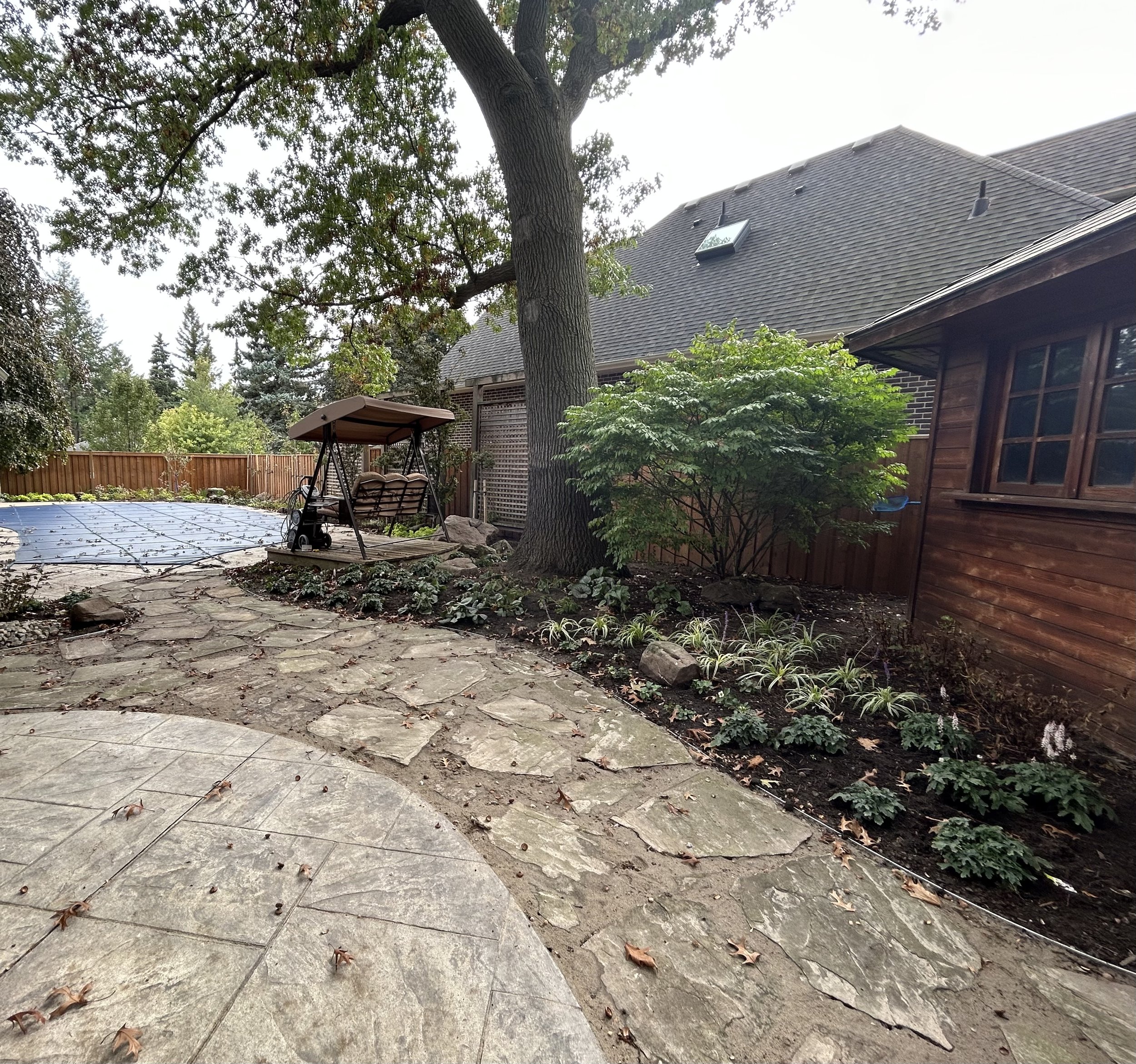 This landscaping project in Etobicoke, Toronto is a Woodland Cottage landscape design reimagined by Master in the Field woodland-cottage-theme-landscape-design-toronto-master-in-the-field-landscape-design-stephanie-leblanc-landscape-designer-clients-