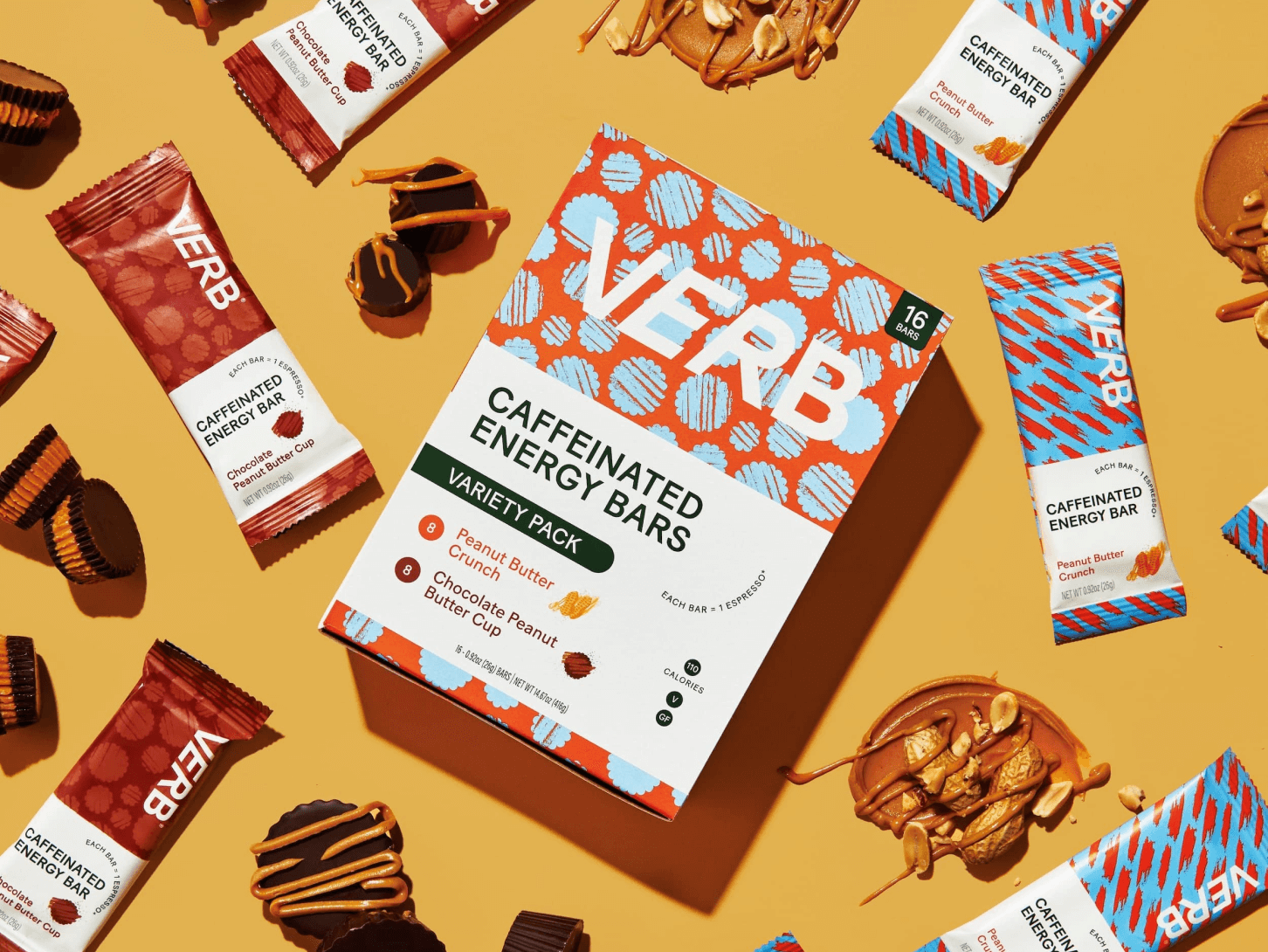 Various Verb Energy Caffeinated Bars laid out with ingredients on orange background