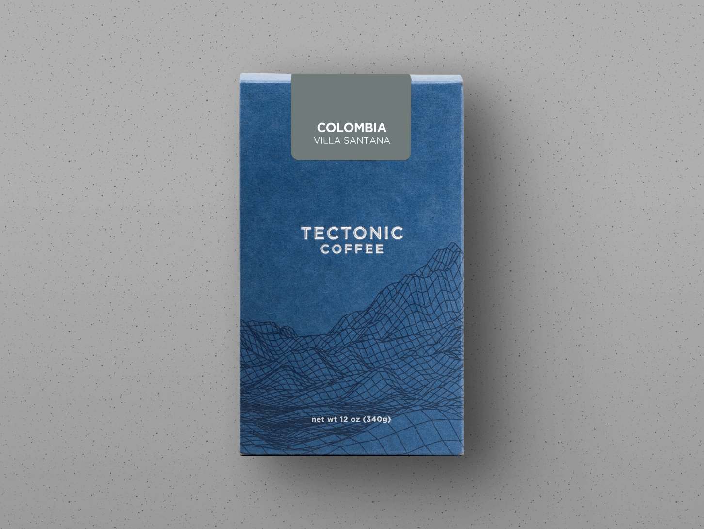 Tectonic Single Origin Coffee on grey textured background