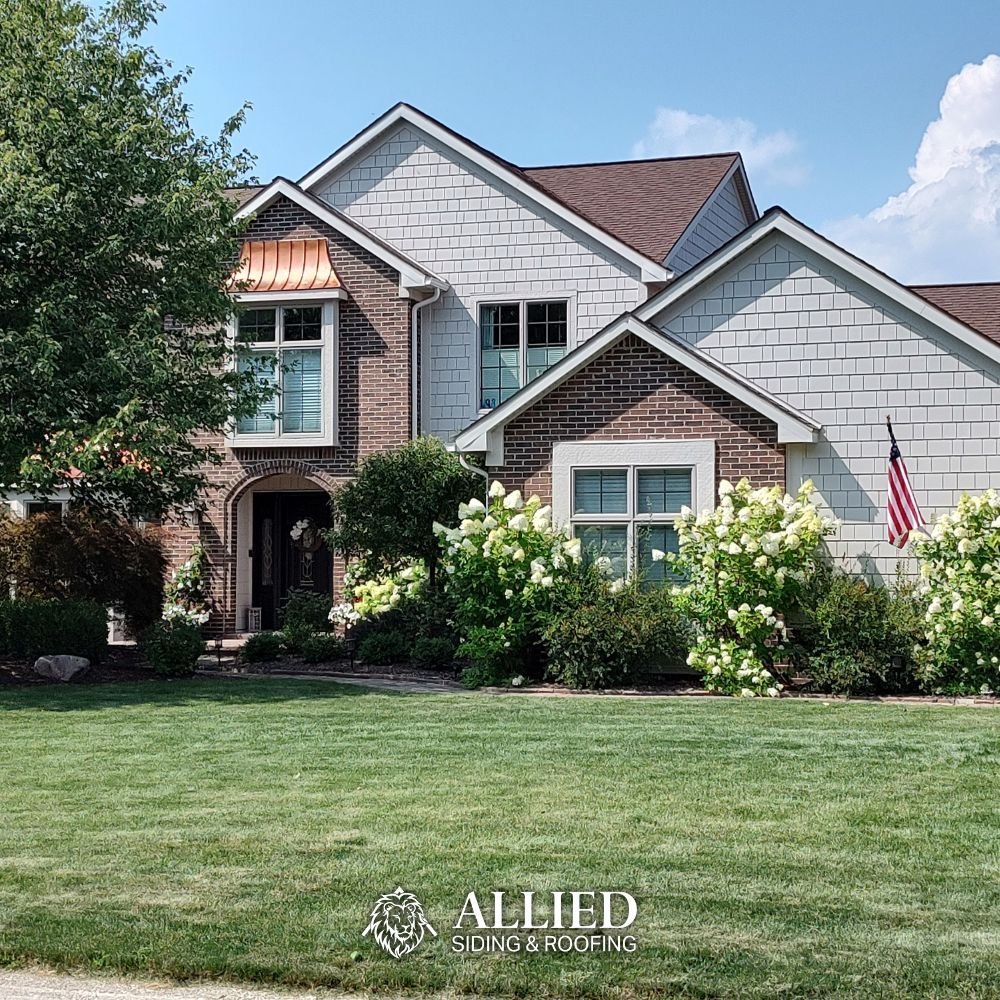We recommend James Hardie Siding the most for Michigan homeowners. It's durable, low maintenance, and incredibly customizable! 

Pictured here: Hardie Straight Edge Shingles in Cobblestone, with Arctic White Trim 🙌🏼