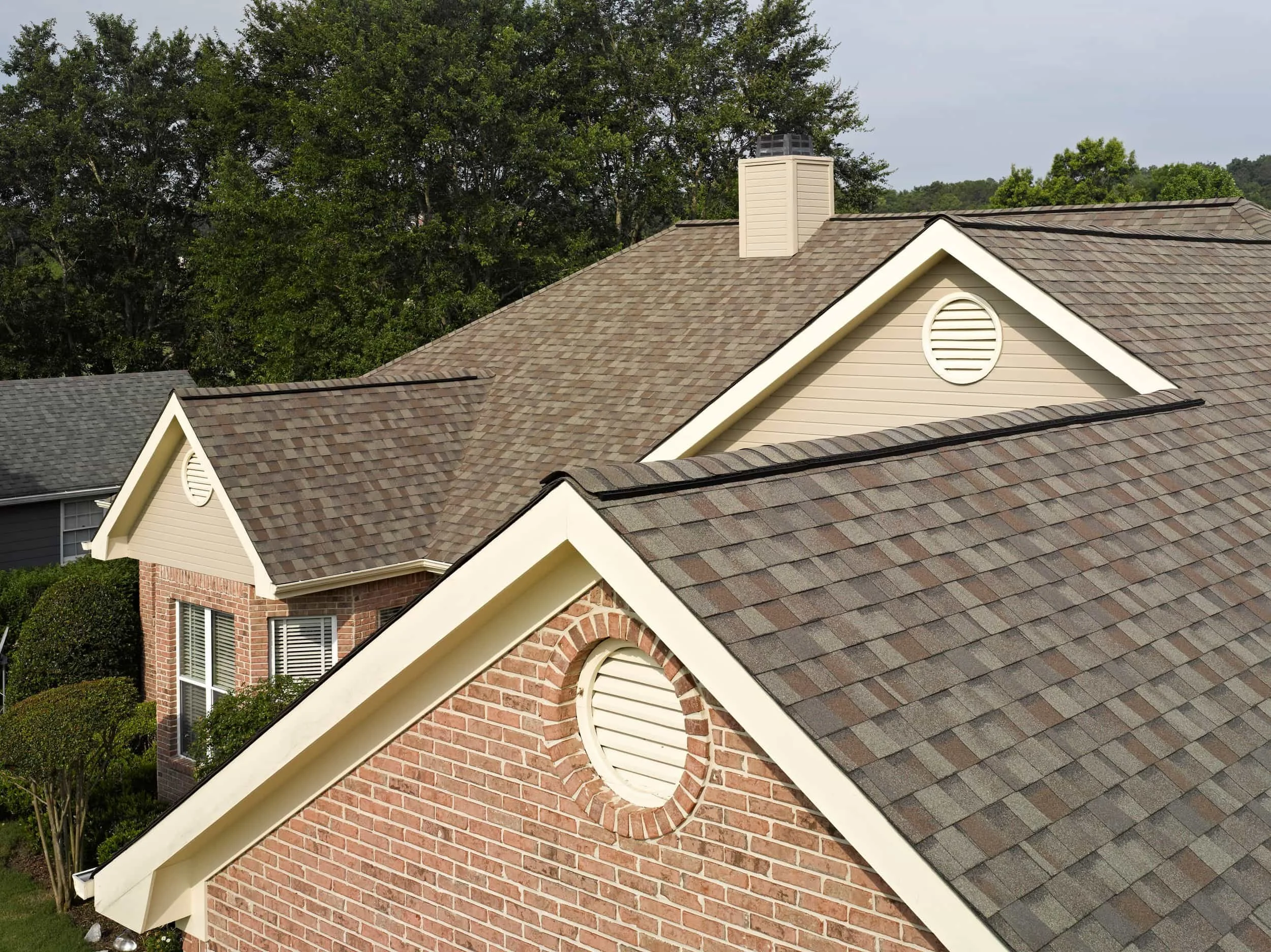 CertainTeed Landmark PRO shingles installed on two-story suburban home with attached garage