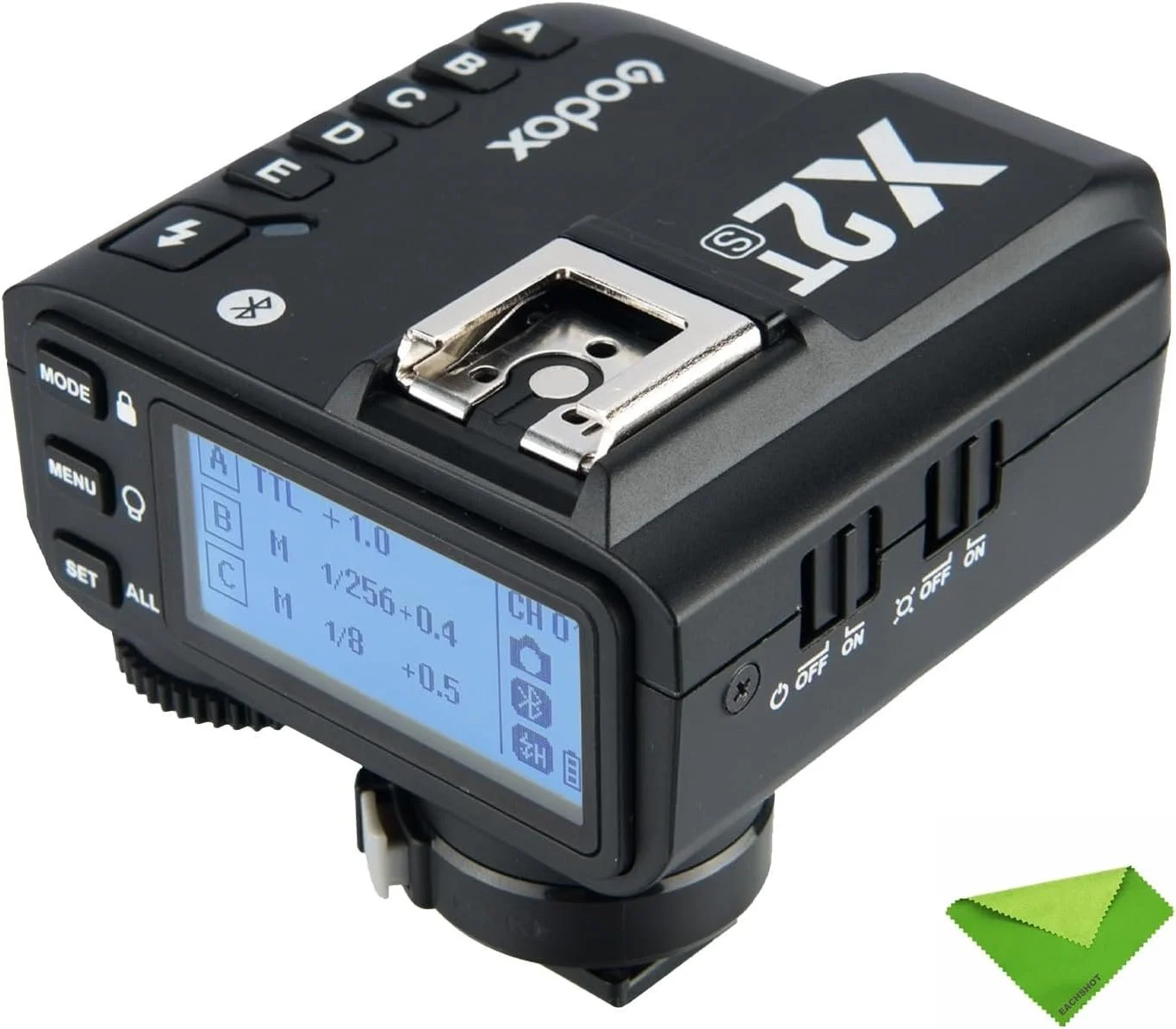A rectangular, black battery pack for camera equipment, with a green indicator light, is displayed.