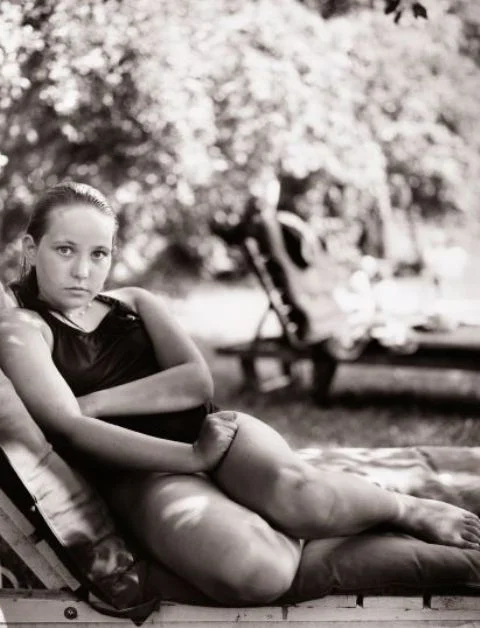 YOUNG GIRL LOUNGING.jpg