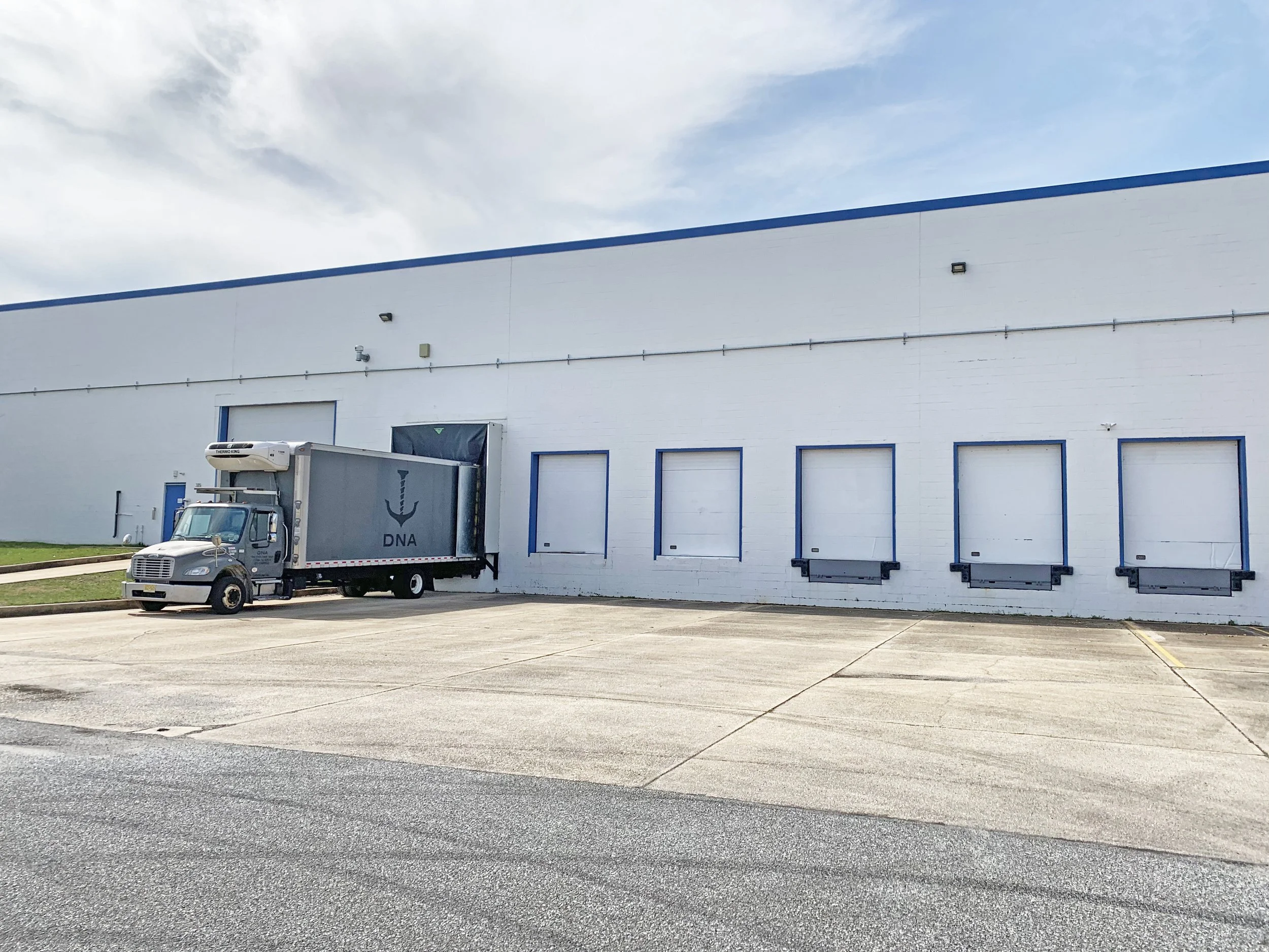 a truck backed into a loading dock
