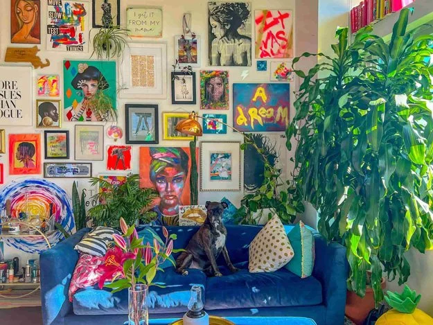 A selection of colourful art work in a colourfully designed lounge.