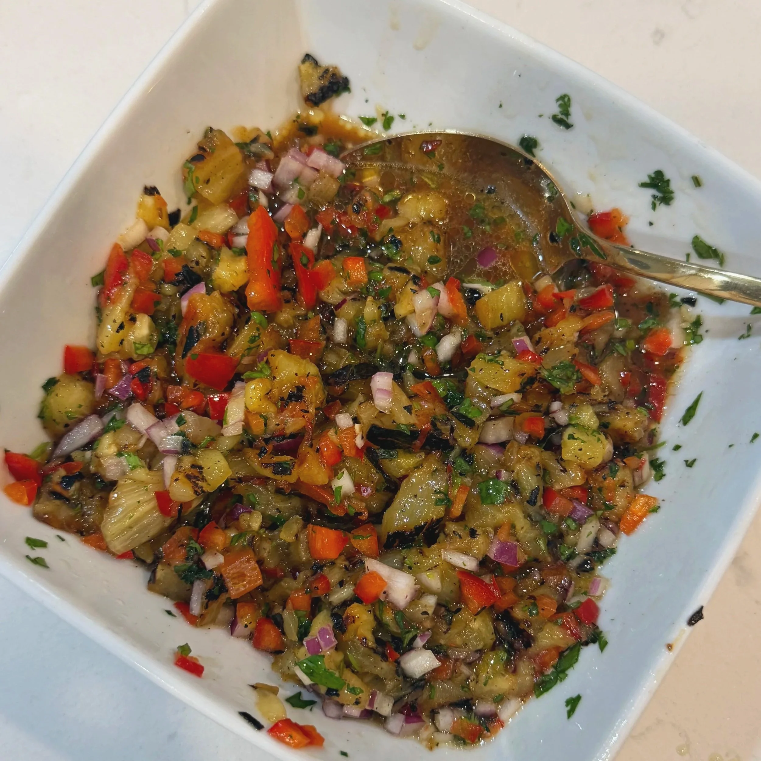 Charred pineapple chimichurri in a bowl