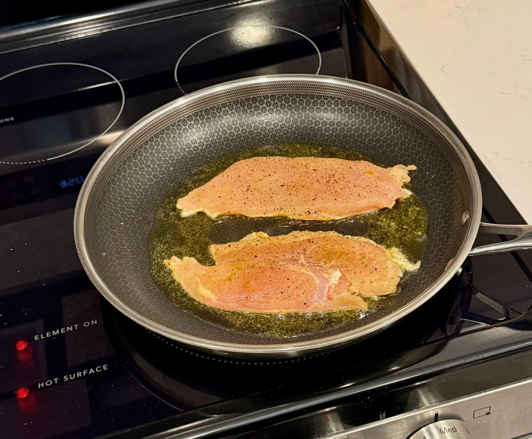 chicken breast in skillet.jpeg