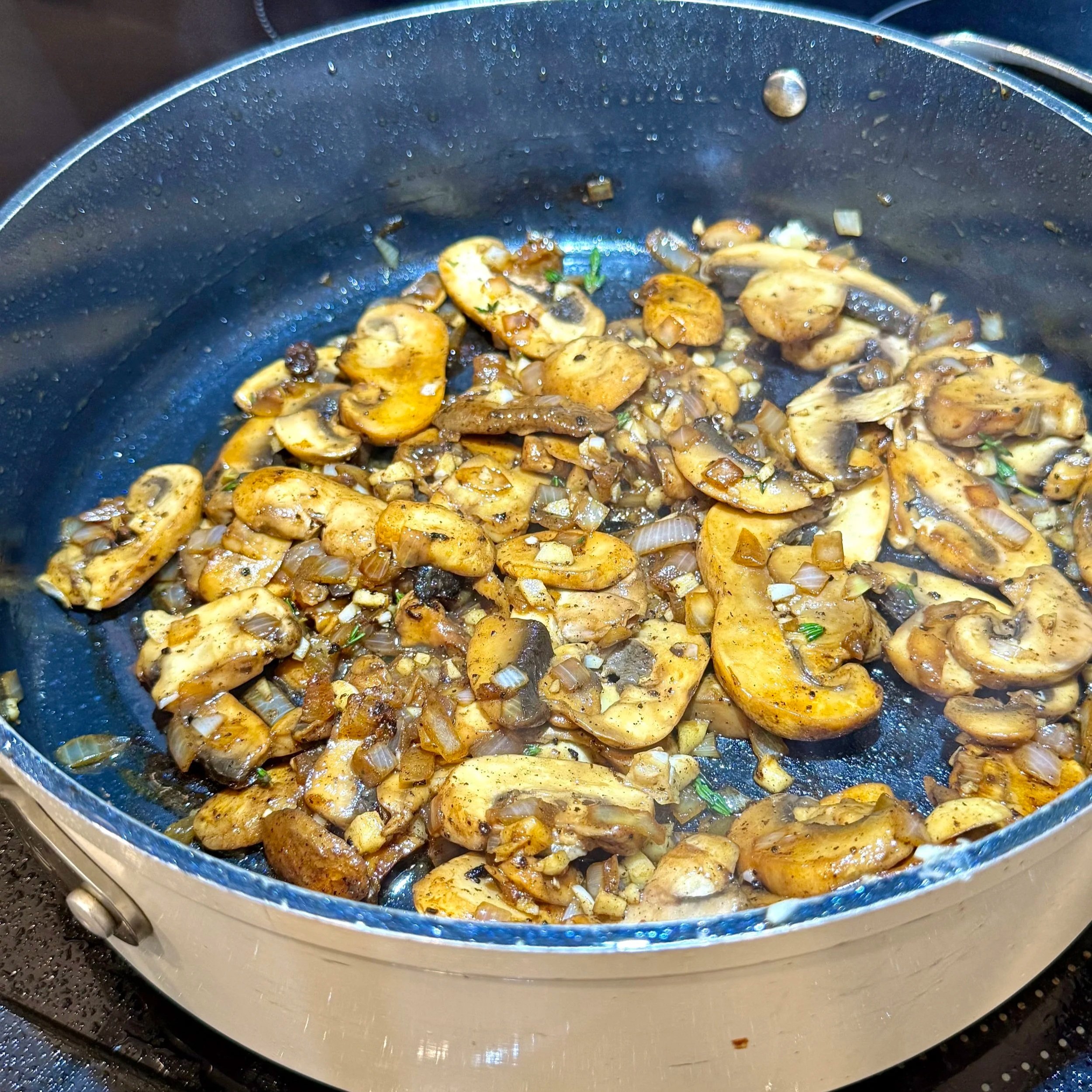 mushrooms-cooking-in-skillet.jpeg