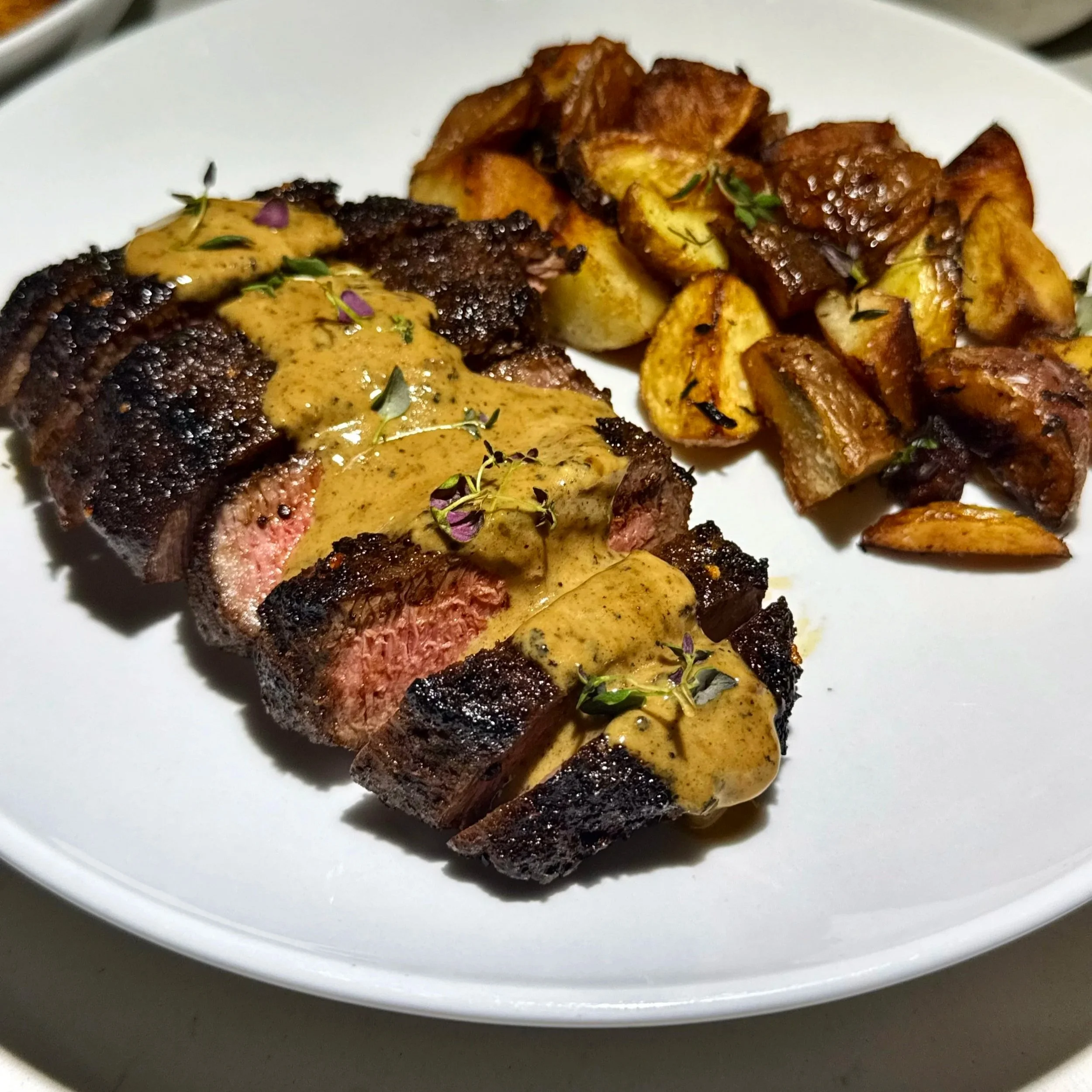 Pimento‑Crusted Steak with Rum‑Peppercorn Pan Sauce &amp; Crispy Thyme Potatoes