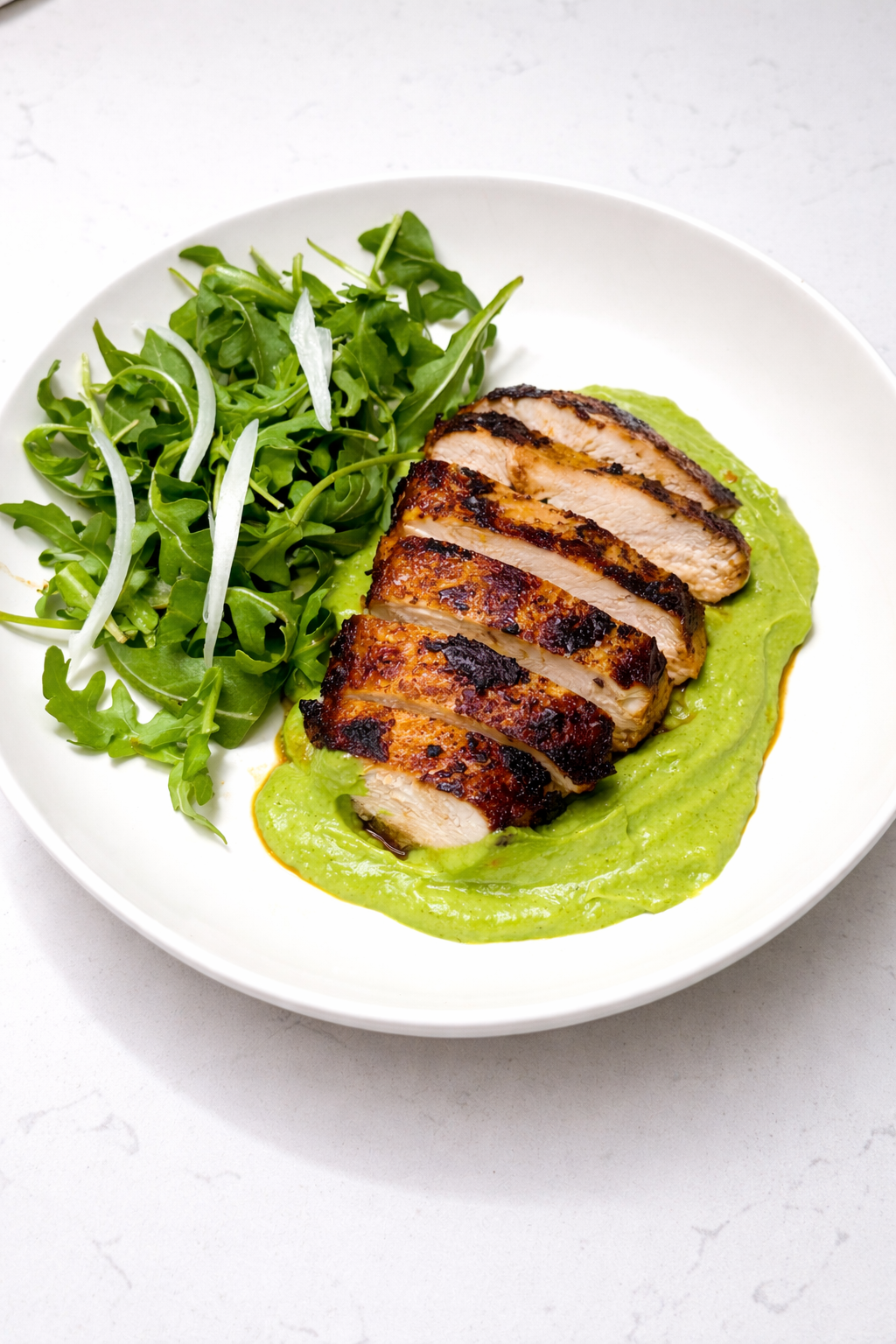 Green-Seasoned Chicken with Creamy Avocado Sauce and Arugula Salad