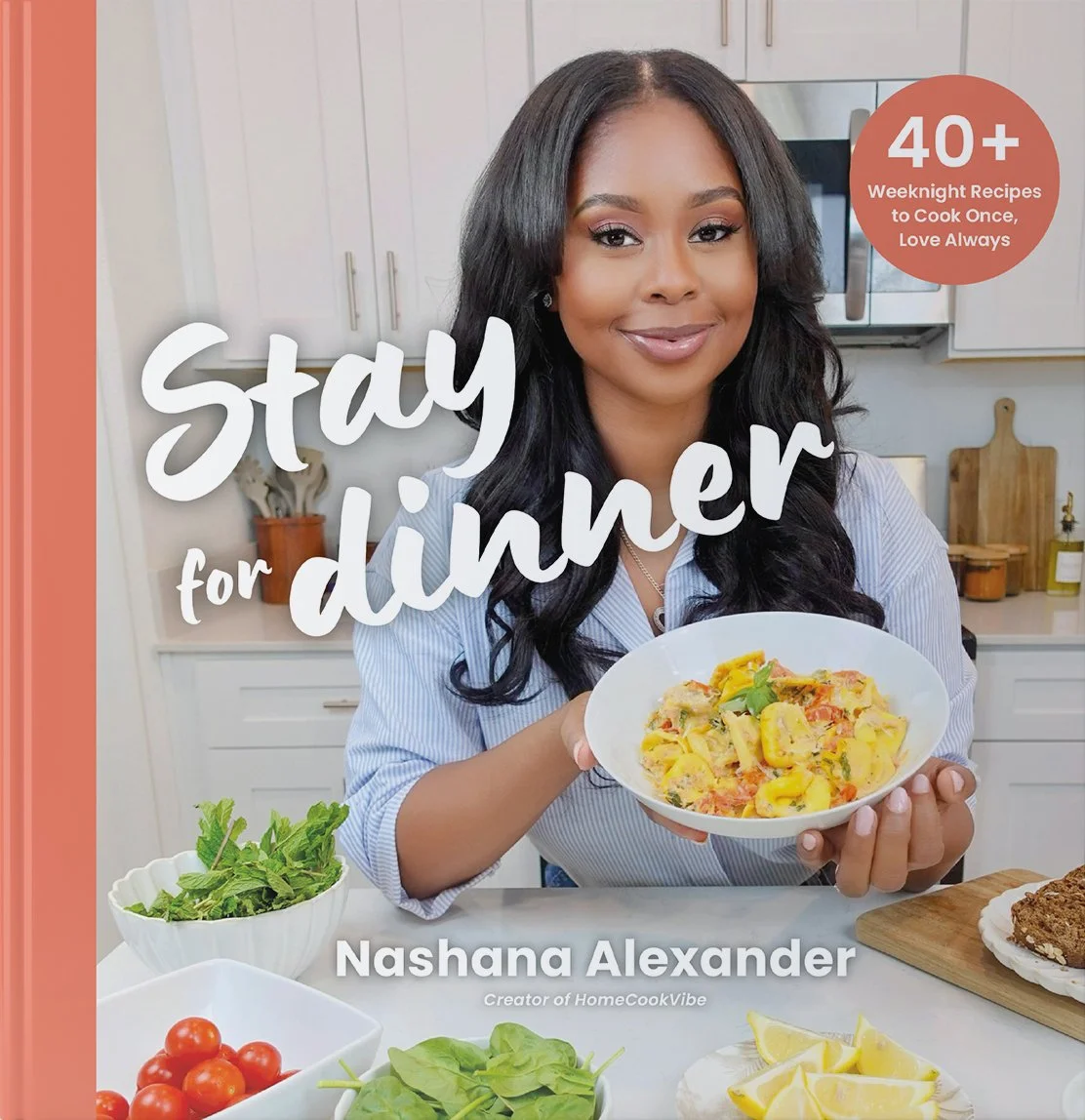 A woman in a kitchen holding a bowl of pasta, with fresh vegetables on the counter, and text indicating a cookbook for staying healthier and cooking meal recipes.