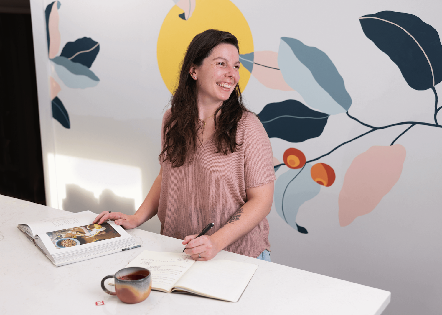 Kaitlyn Carroll, holistic health and wellness coach offering virtual coaching services.