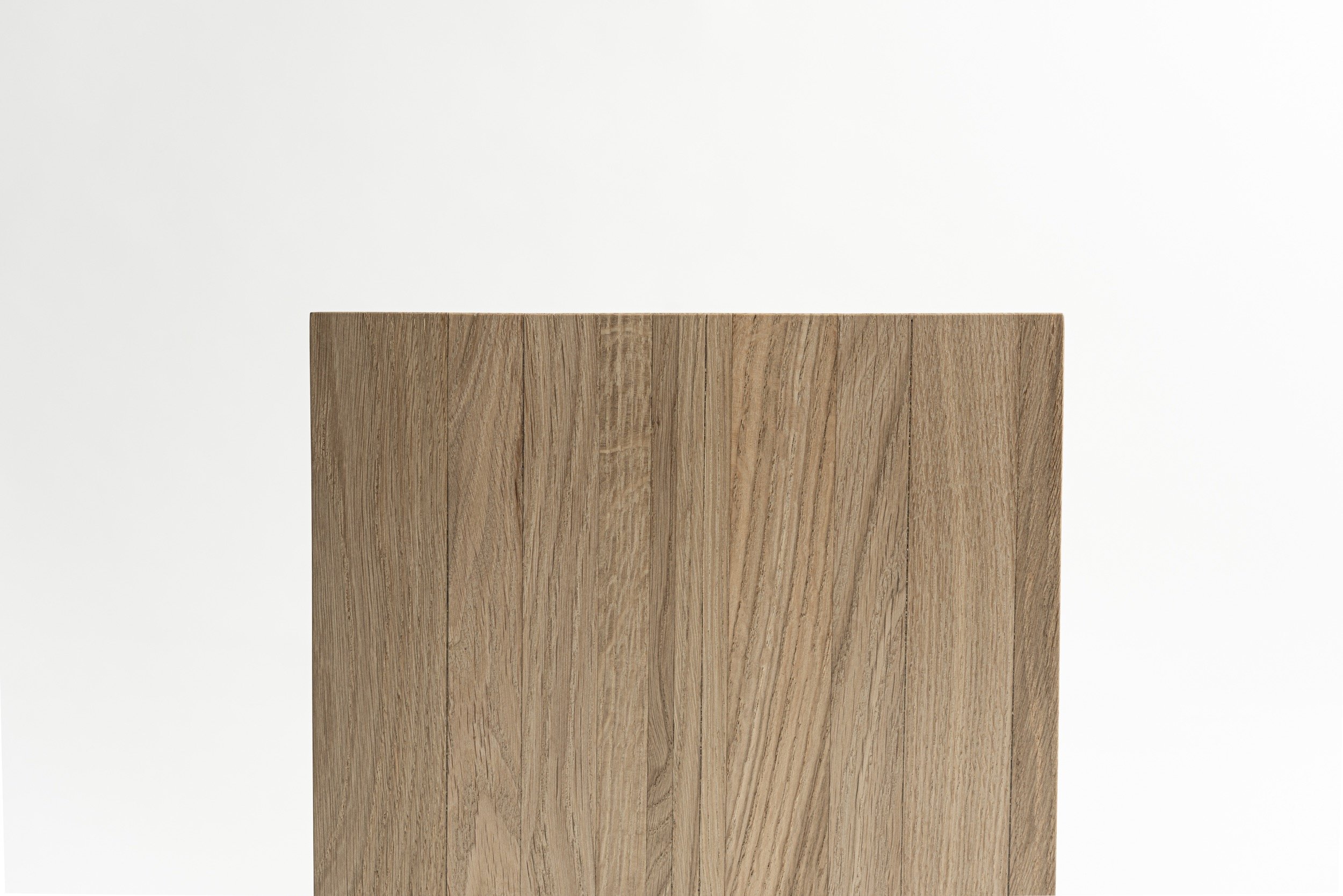 Back to Solid is a wooden block stool that we handcrafted for your home spaces. Made of 311 leftover oak planks. Put together in a random order back to solid oak. The Oak. Long Live the Oak.