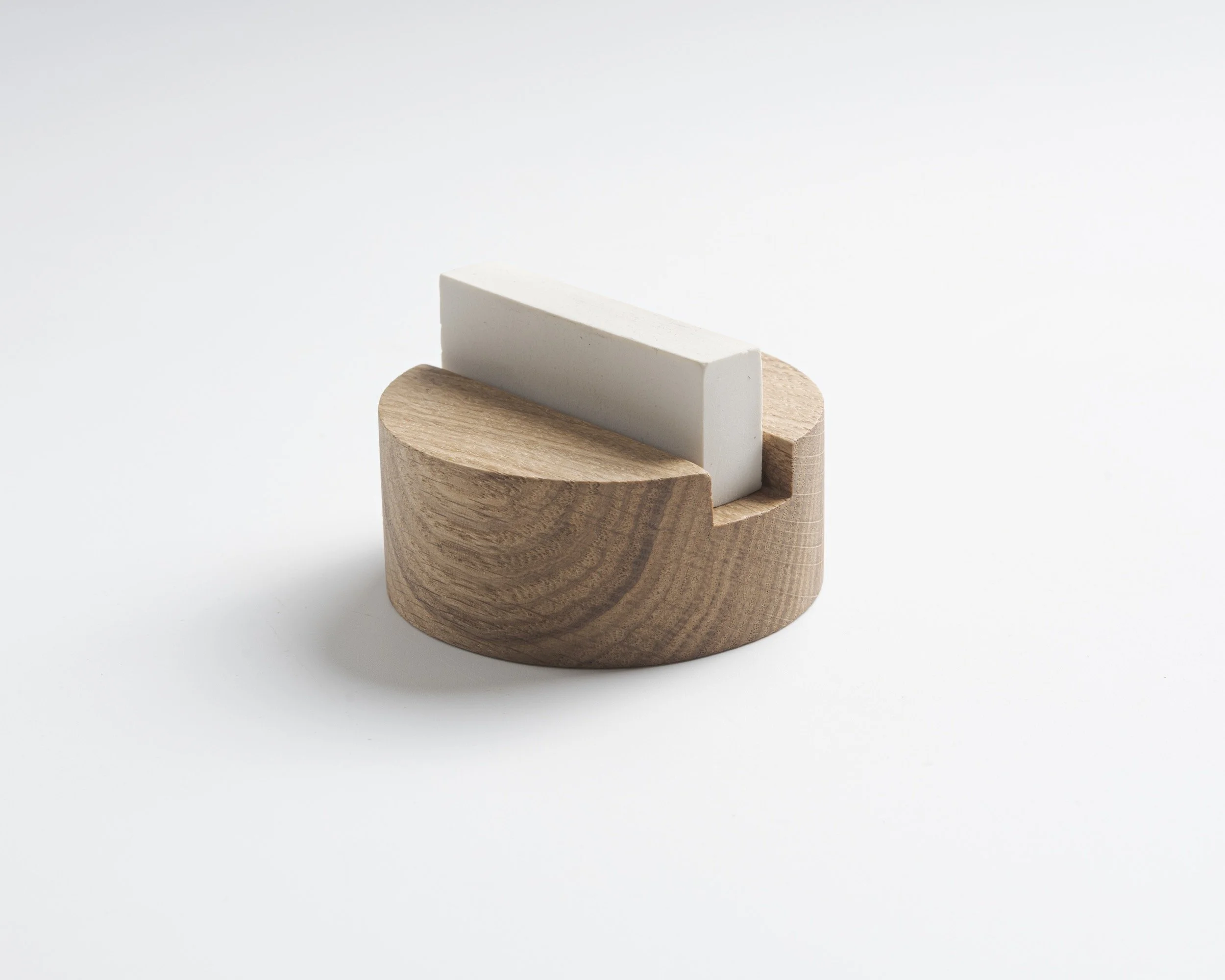 Handcrafted desk organizer set for pencils, eraser, and sharpener. Each set includes 3 separate solid oak holders designed to accommodate essential writing/sketching tools. The Oak. Long Live the Oak.
