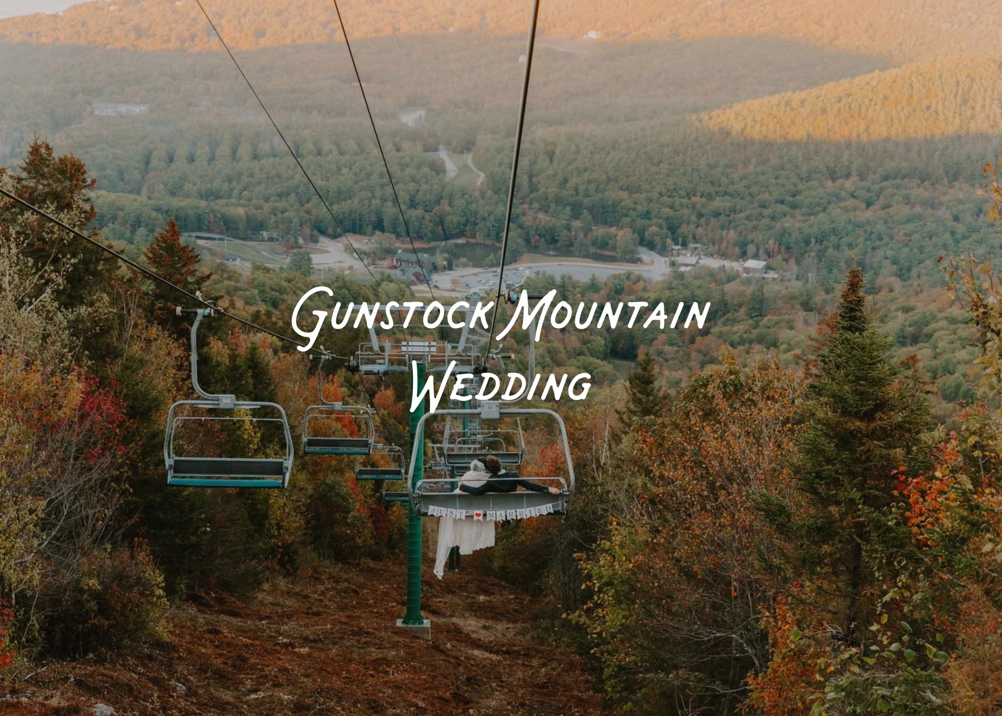 Couple riding the chair lift at their ski resort wedding