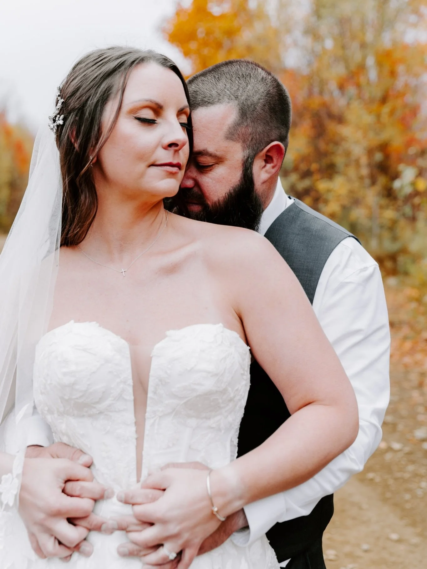 Sometimes I get to go to a place I have never been to before and fall in love with it. These two brought me to Rangeley, Maine for their intimate elopement on a cold and quiet fall day. We explored a mountain by car, we had a moose witness their cere