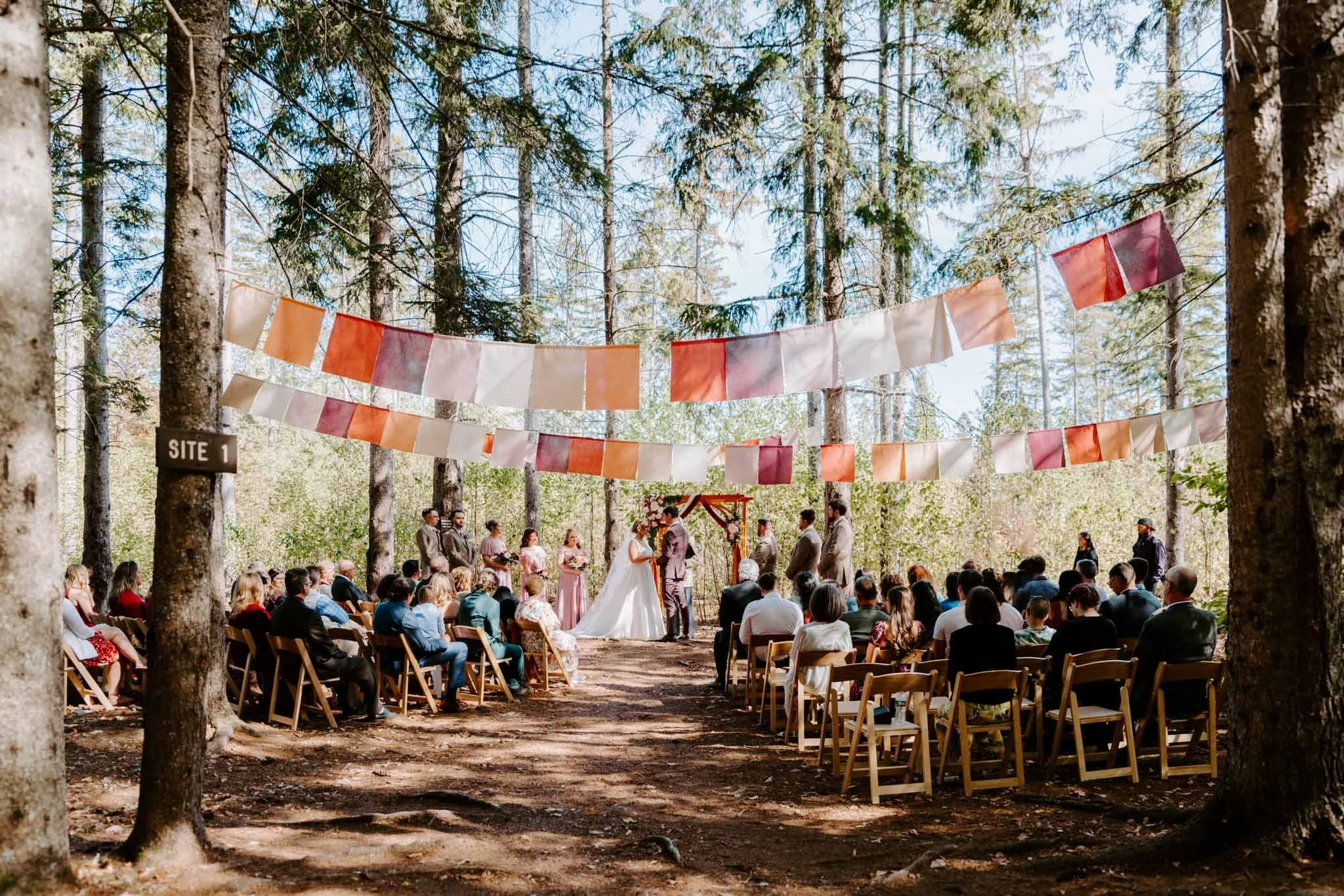 Romantic wooded wedding ceremony at a mountain