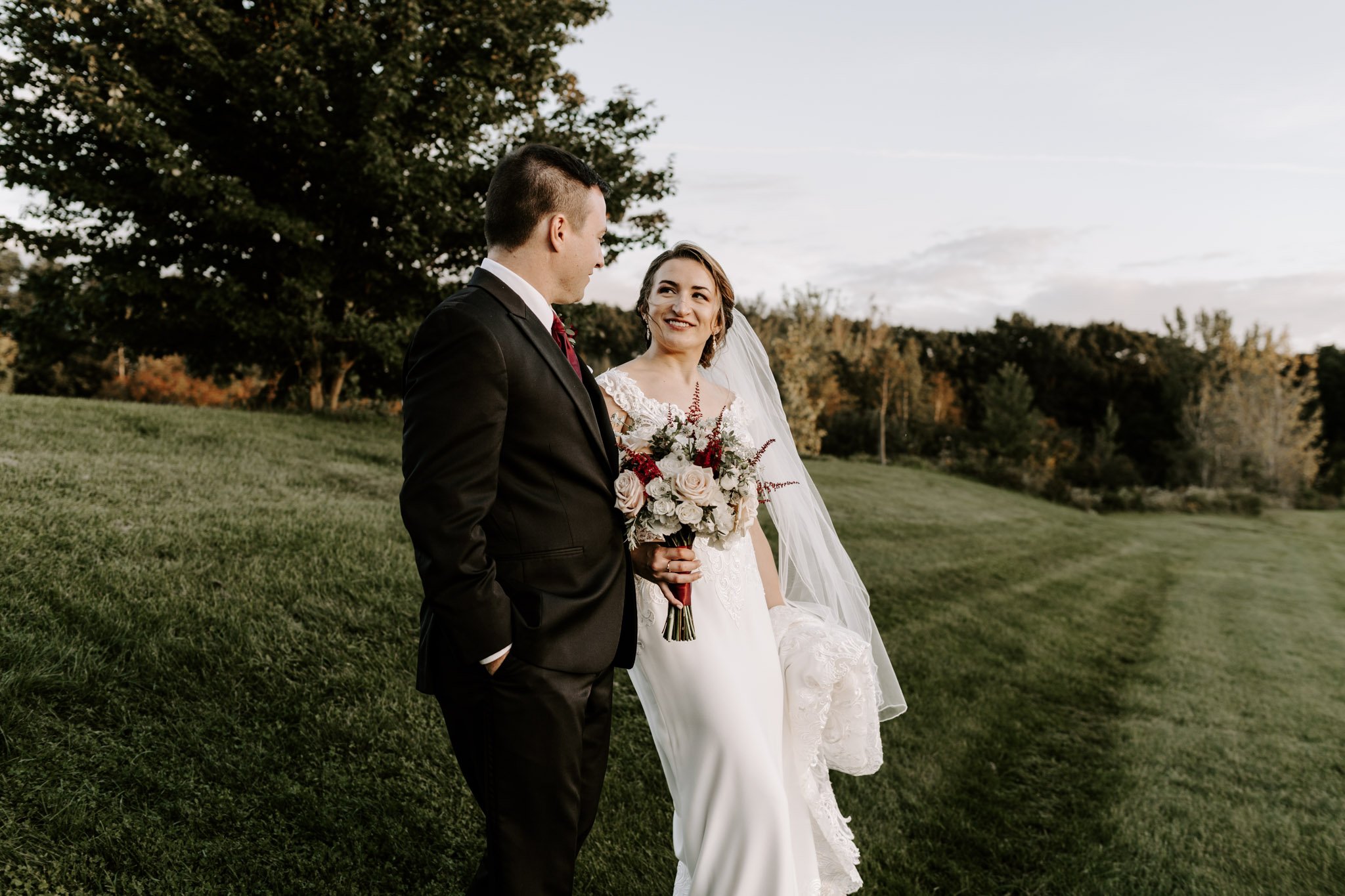 Photo of a bride and groom at sunset