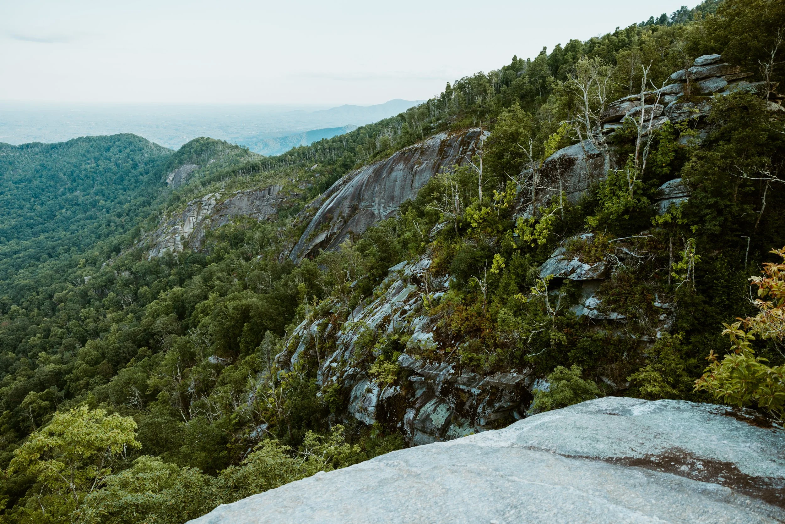 How to elope in North Carolina? Couple gets legally married at the courthouse and then shares their vows on top of a mountain and has a little adventure.