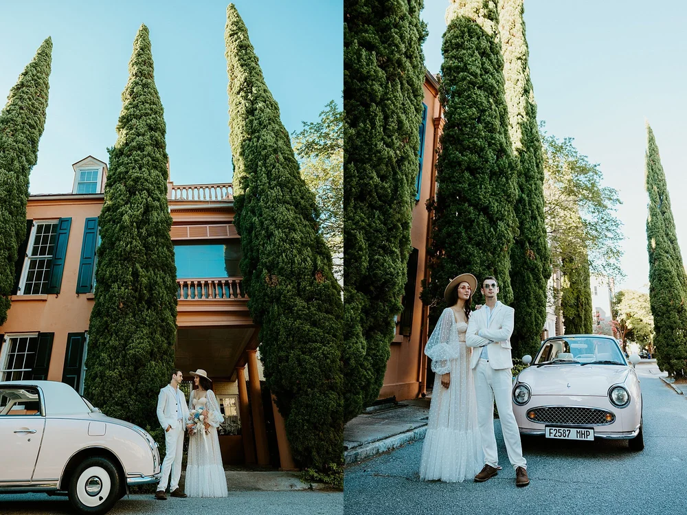 Couple stands together beside The Pink Figgy in front of a pink house with large manicured trees. They are heading to elope in Charleston SC